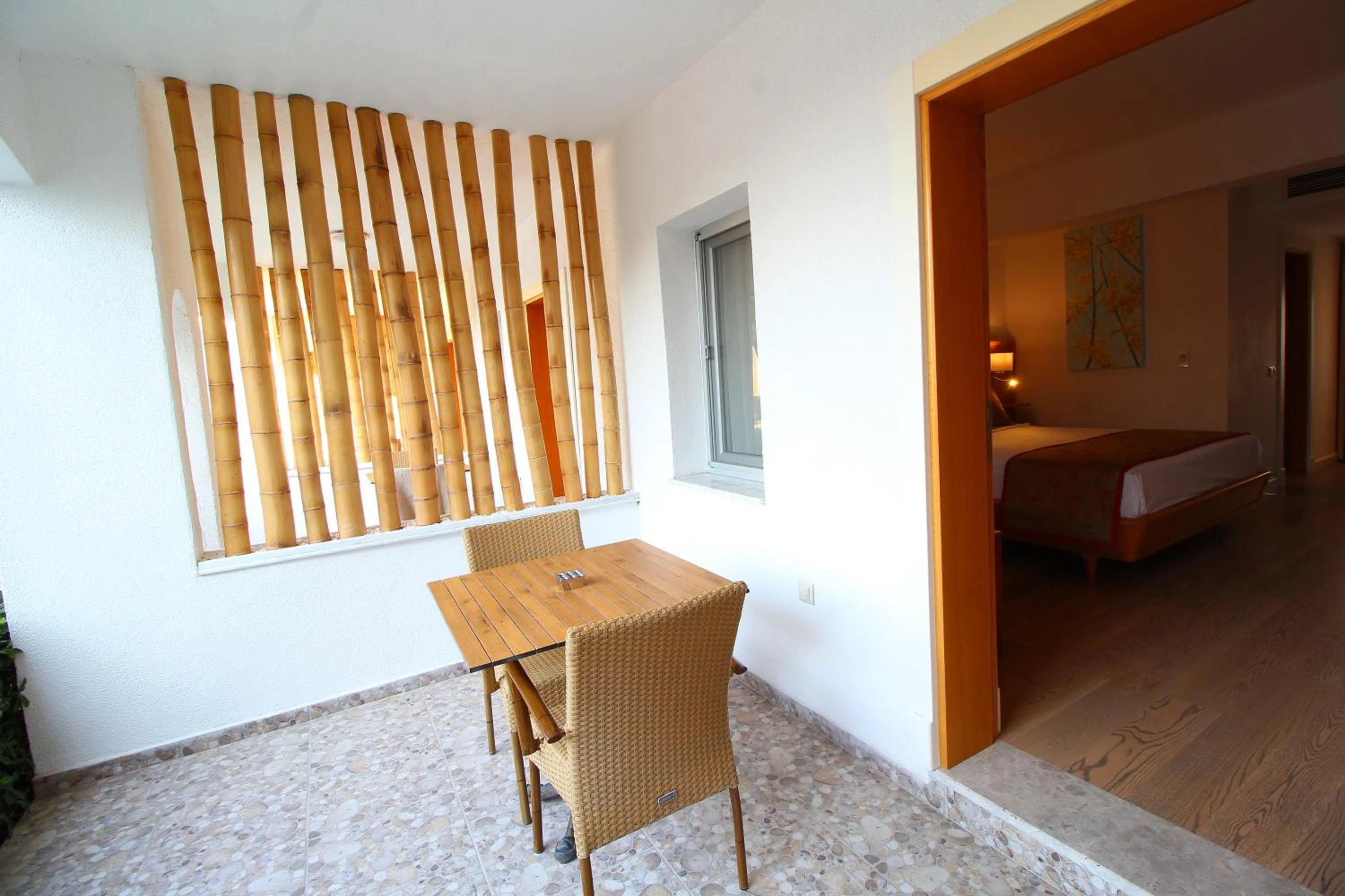 Patio, Bed in The Losh Hotel