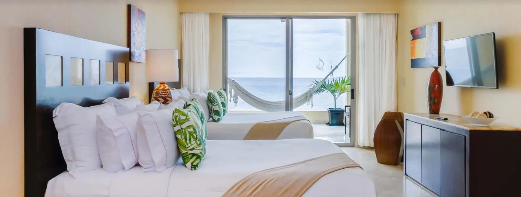 Bed in GARZA BLANCA PRESERVE RESORT & SPA