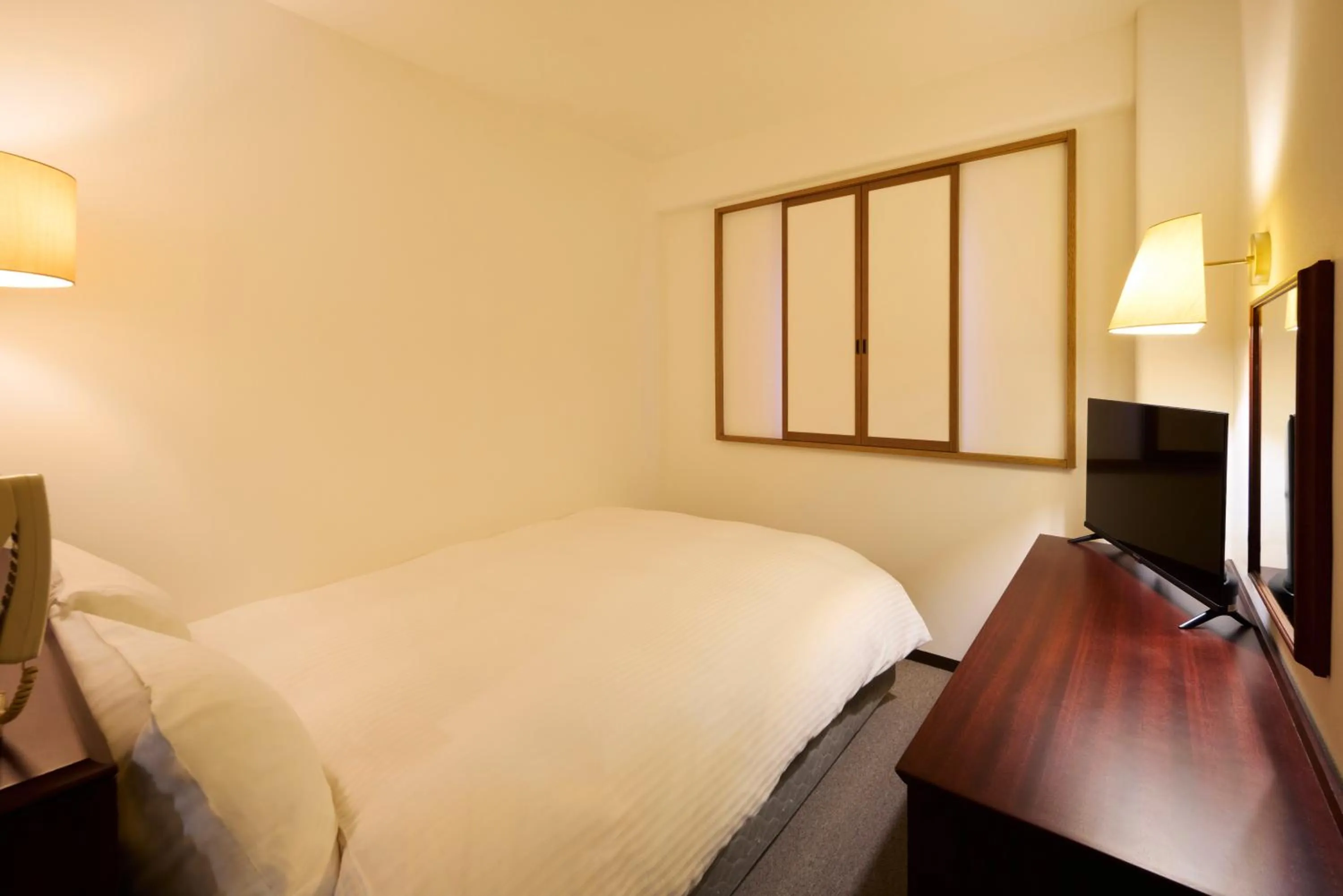 Photo of the whole room, Bed in Centurion Hotel Hamamatsu