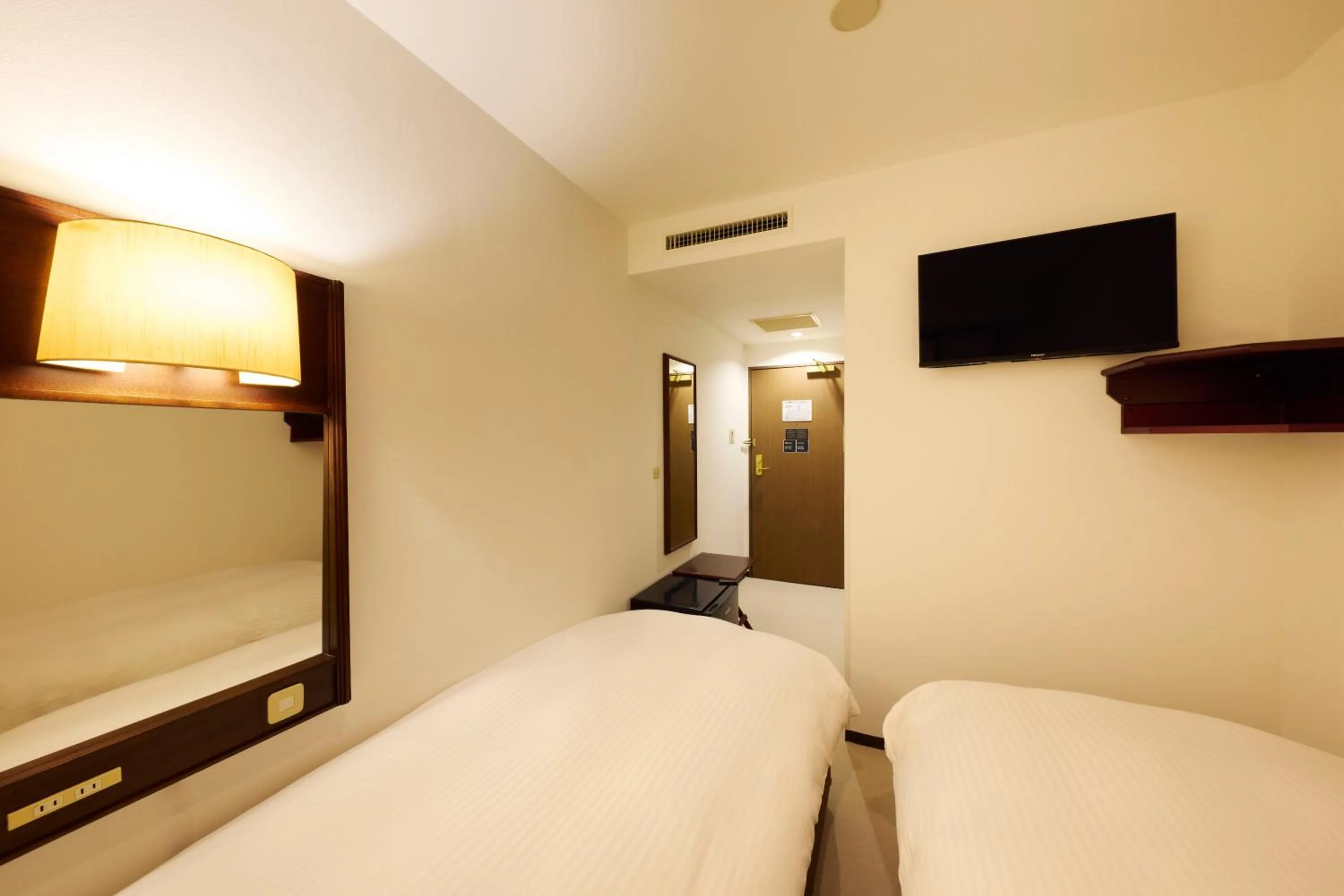 Photo of the whole room, Bed in Centurion Hotel Hamamatsu