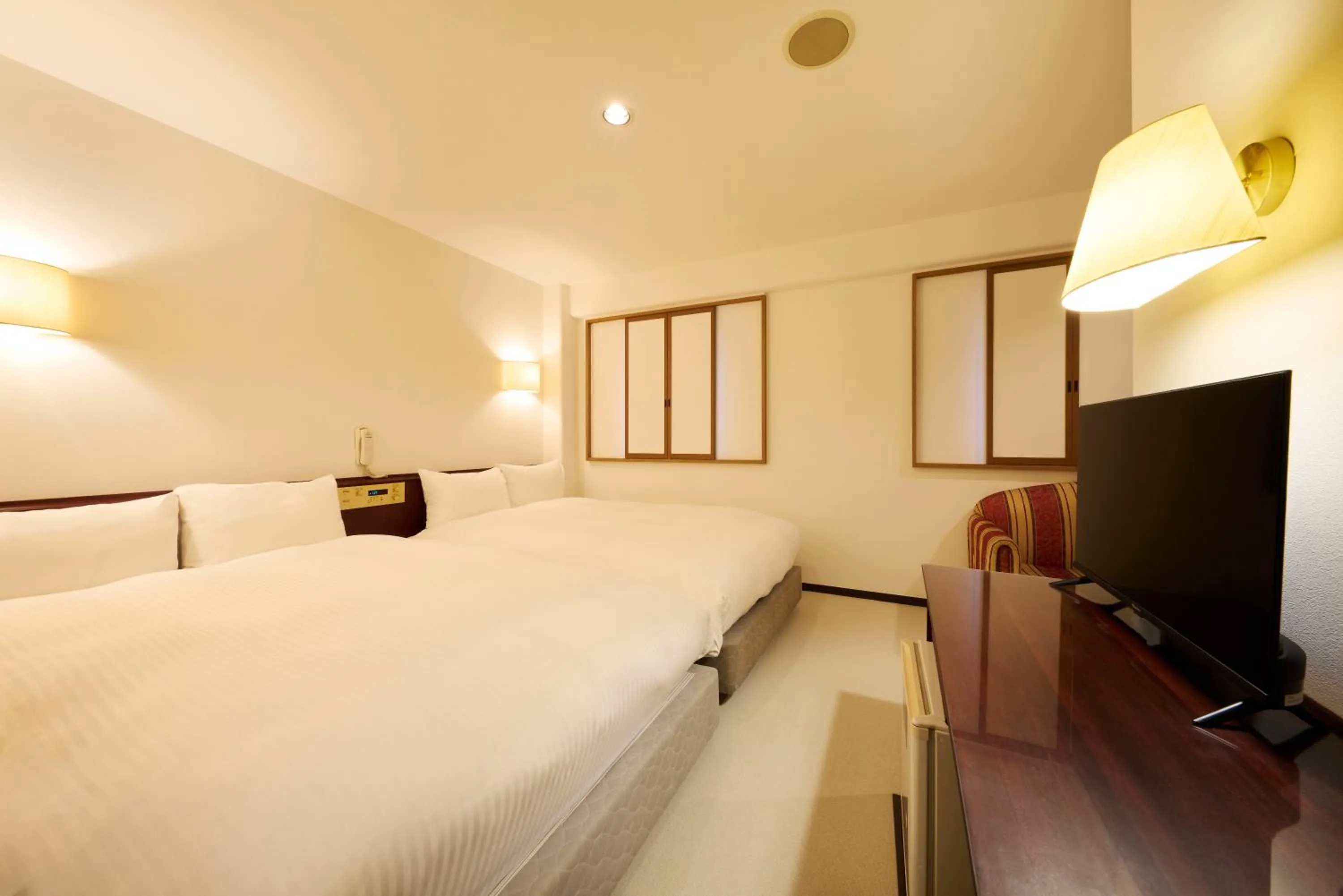 Photo of the whole room, Bed in Centurion Hotel Hamamatsu