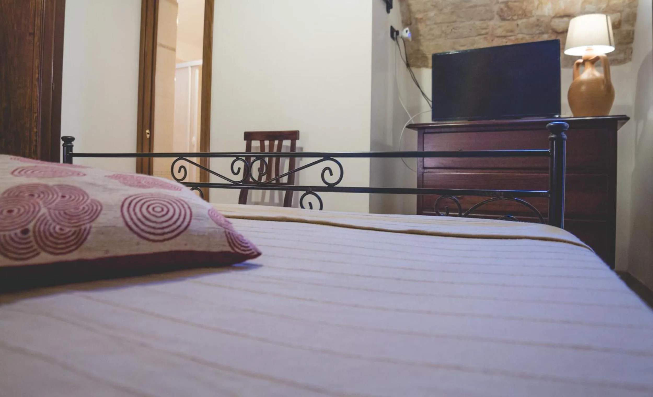 Bed in Trulli-eu Guesthouse Alberobello