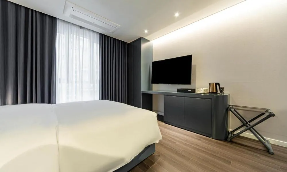 Photo of the whole room, Bed in Pohang Hotel Noblion