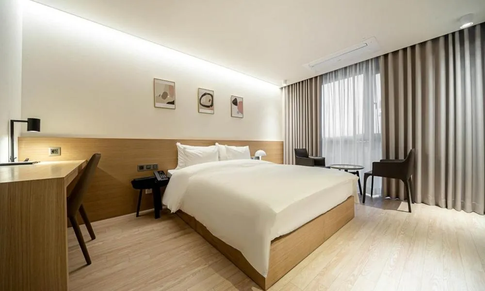 Photo of the whole room, Bed in Pohang Hotel Noblion