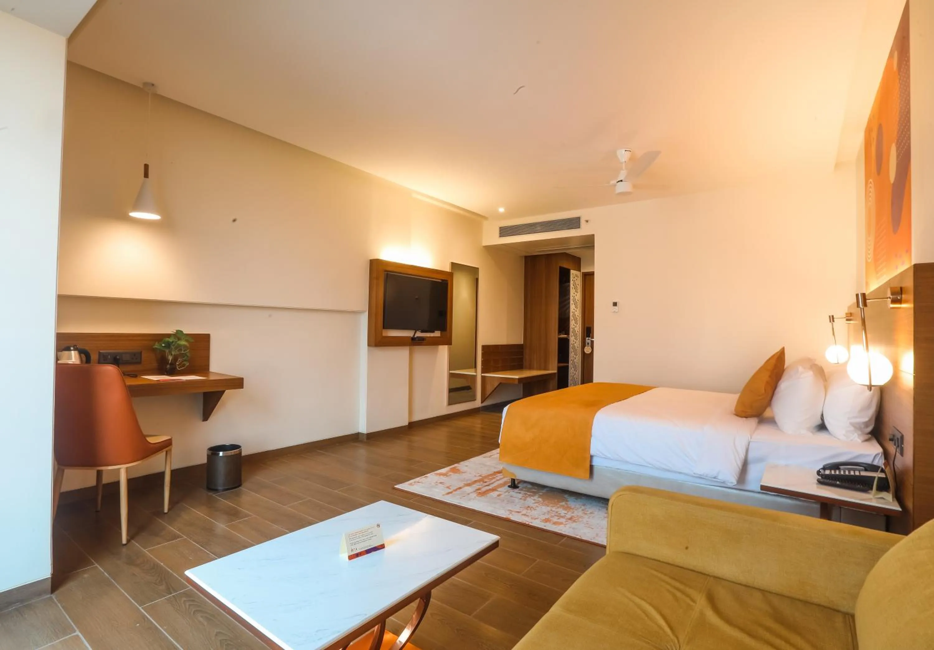 Seating area, Bed in IRA by Orchid Sambhajinagar - Aurangabad