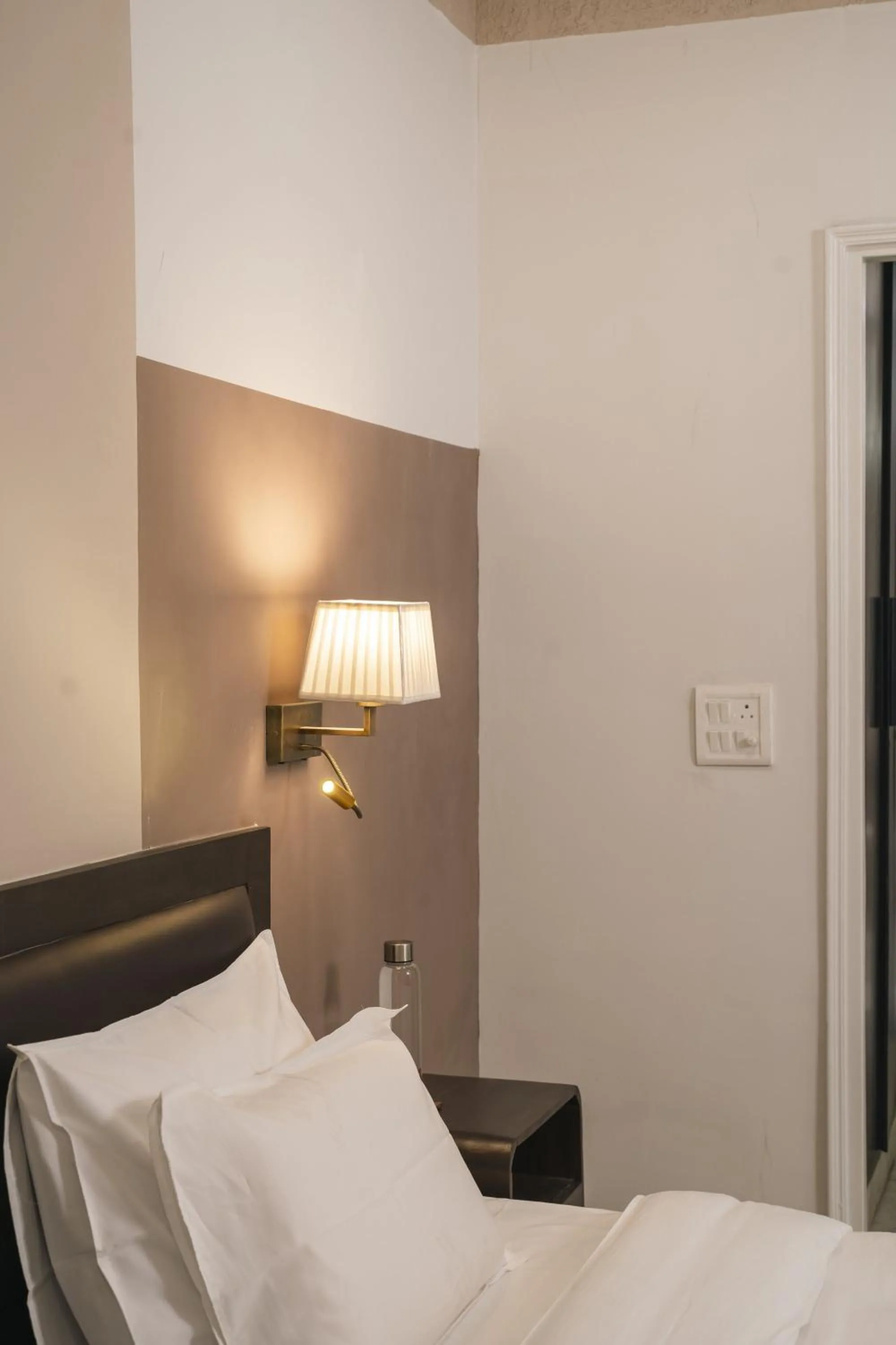 Bed in Firebrick Boutique Residences - GARNET HOUSE