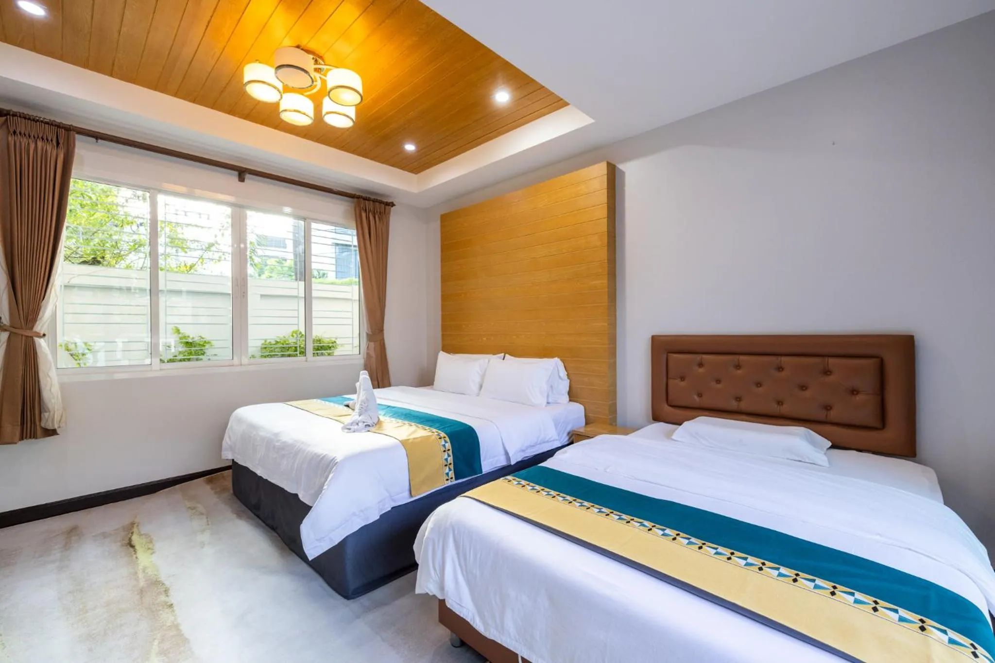 Bed in Kana Hotel Phuket普吉岛卡娜酒店