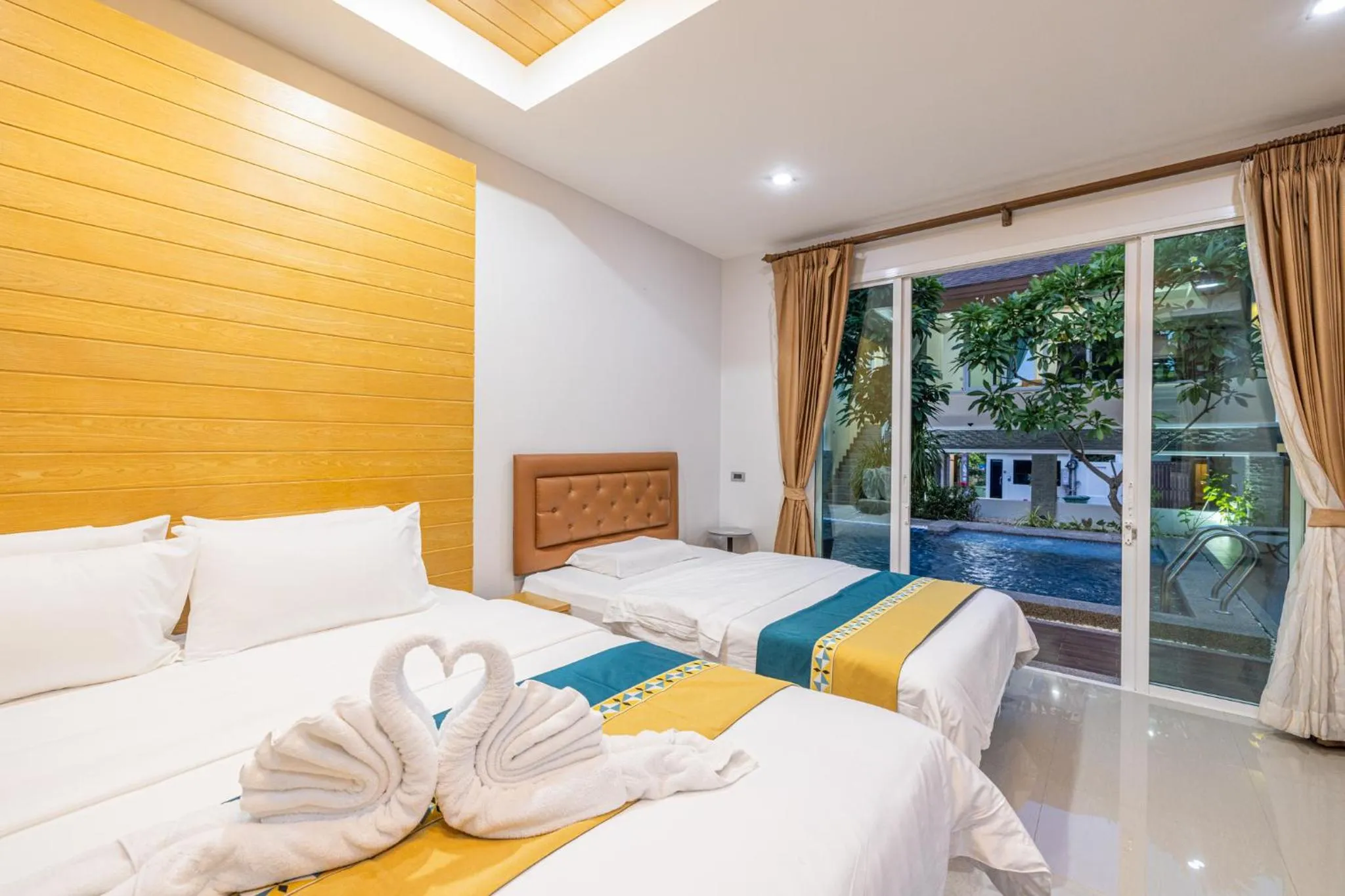 Bed in Kana Hotel Phuket普吉岛卡娜酒店