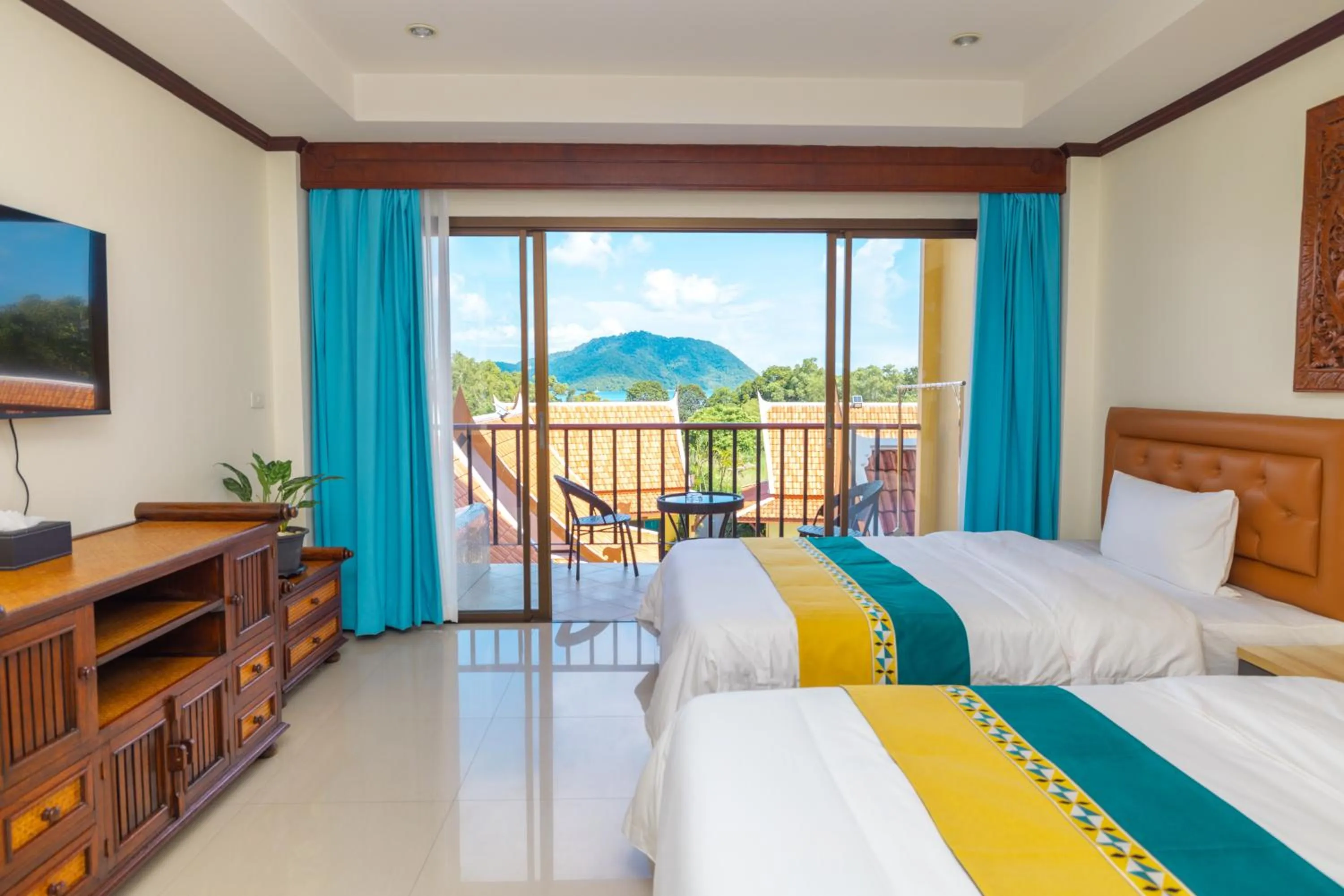 Communal lounge/ TV room, Bed in Kana Hotel Phuket普吉岛卡娜酒店