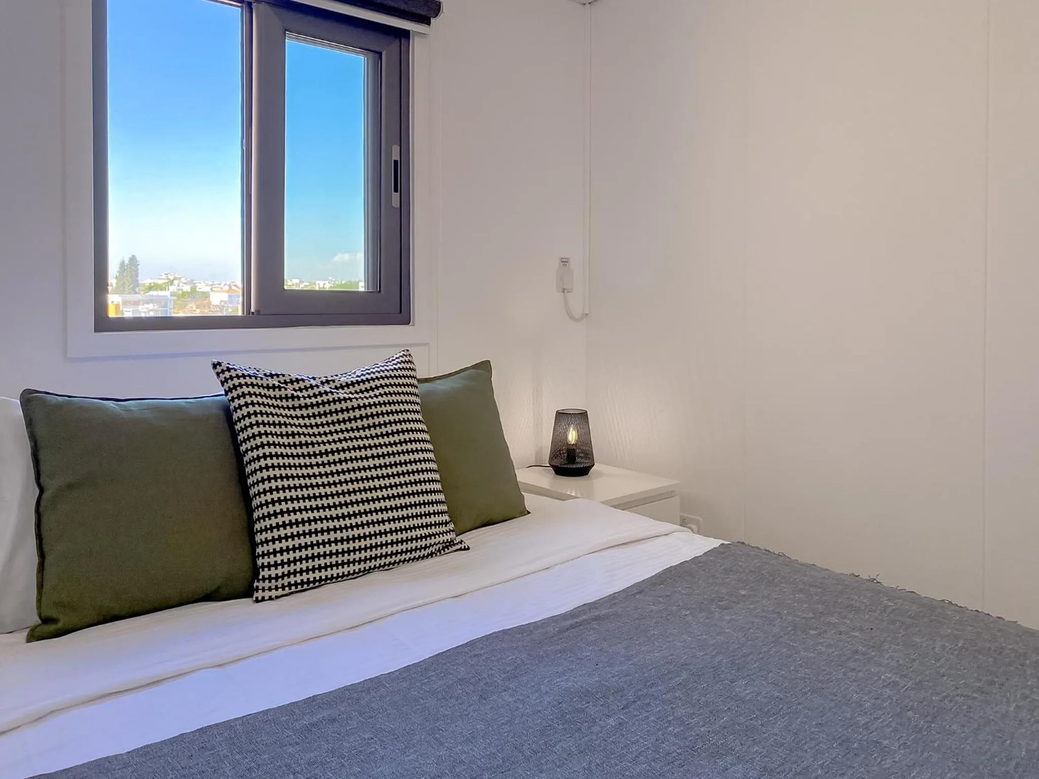 Bed in Phaedrus Living: Ourania City Heights Flat