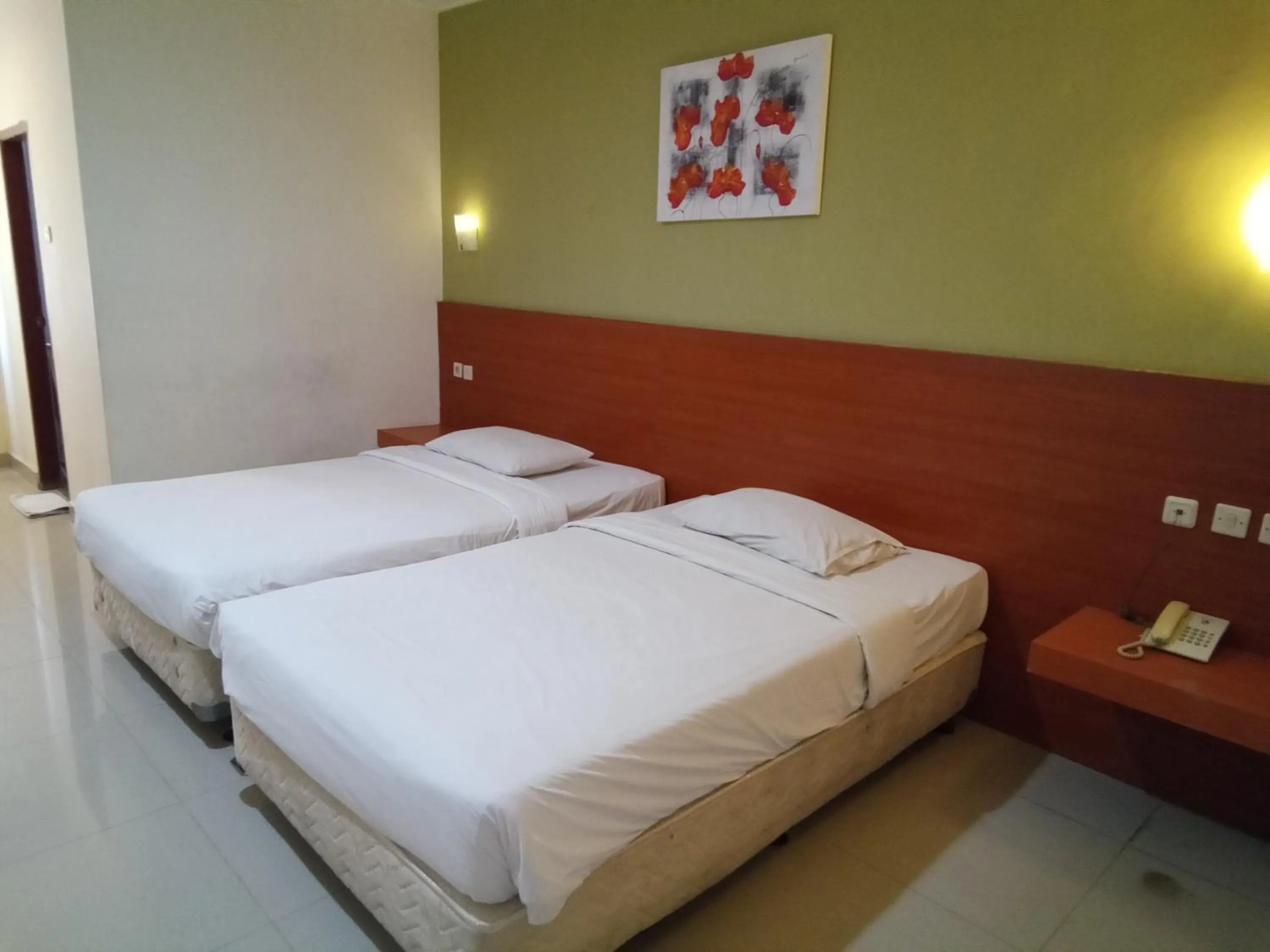 Bed in Puri Dibia Kuta Hotel & Apartment