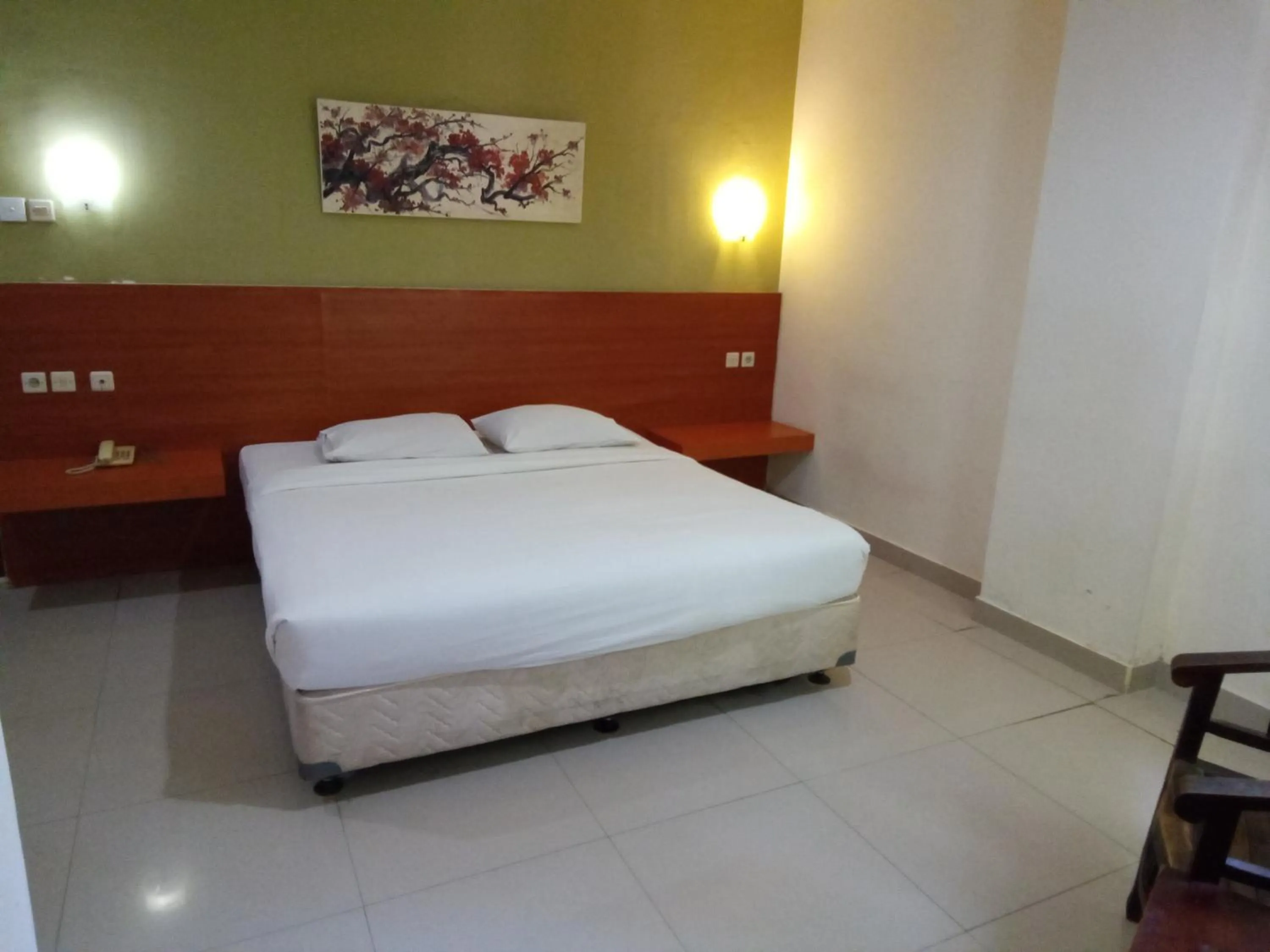 Bed in Puri Dibia Kuta Hotel & Apartment