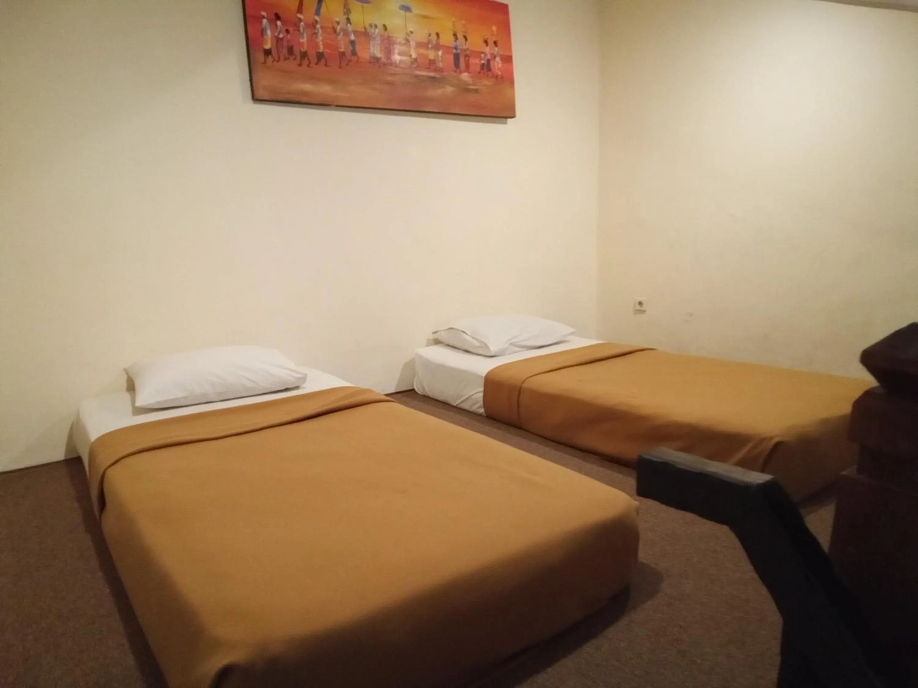 Bed in Puri Dibia Kuta Hotel & Apartment