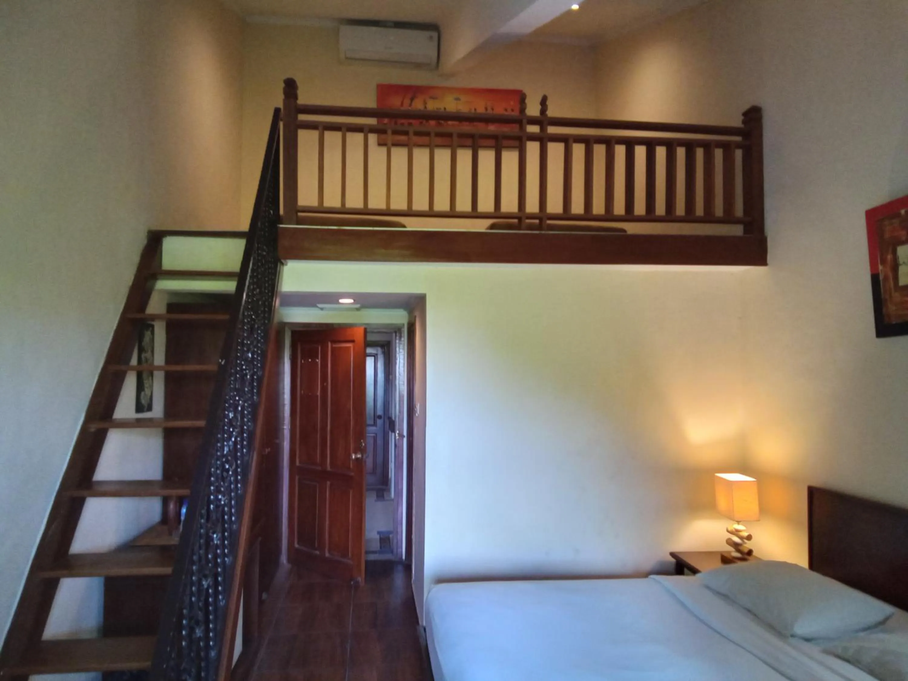 Bed in Puri Dibia Kuta Hotel & Apartment