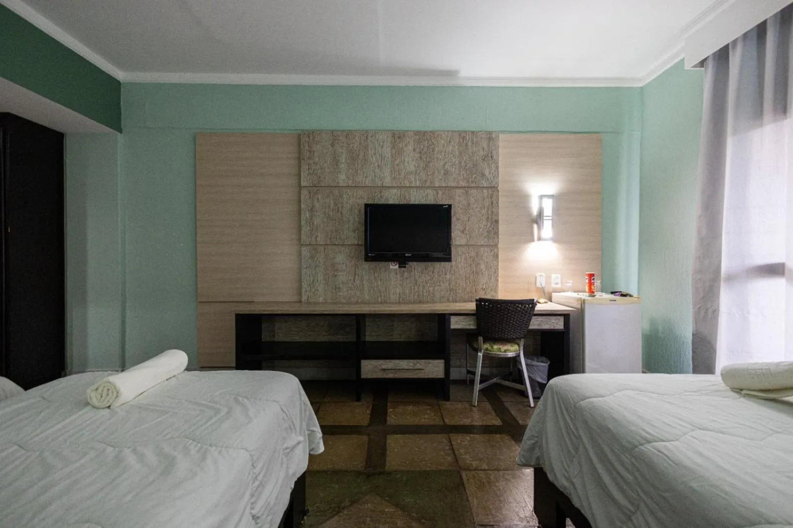 Bed in ARAGUAIA HOTEL