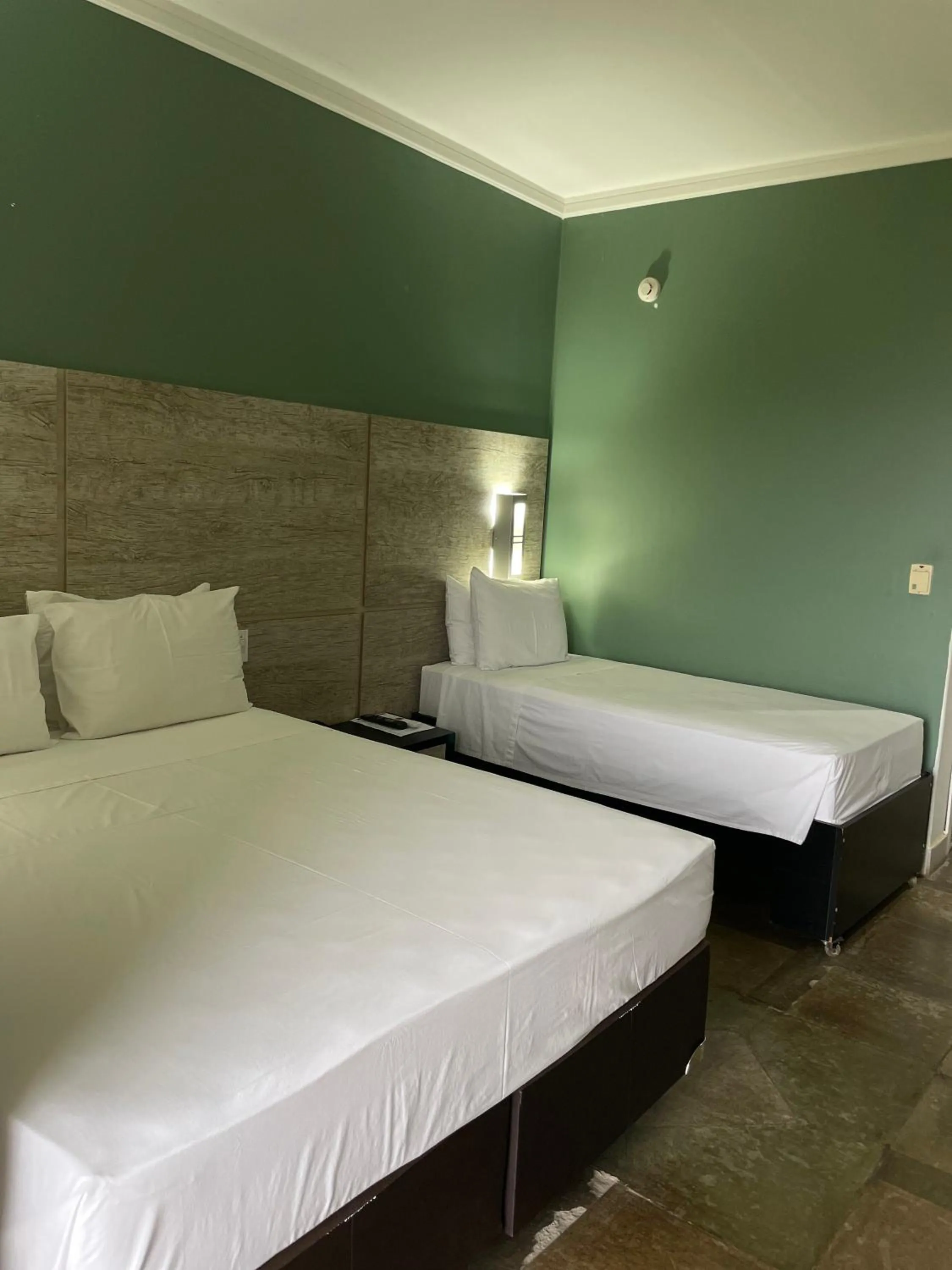 Bed in ARAGUAIA HOTEL