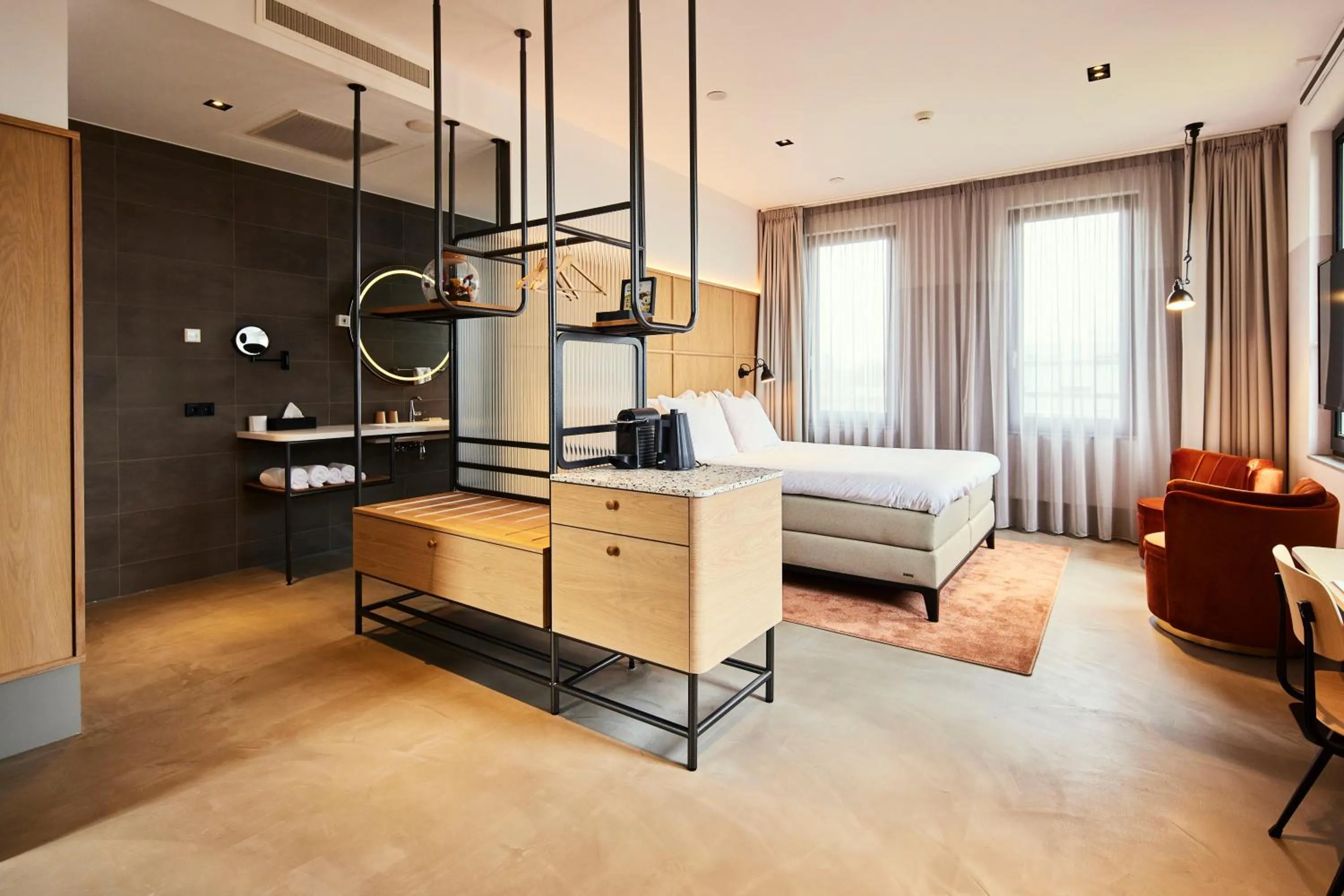 Seating area, Bed in Notiz Hotel Leeuwarden