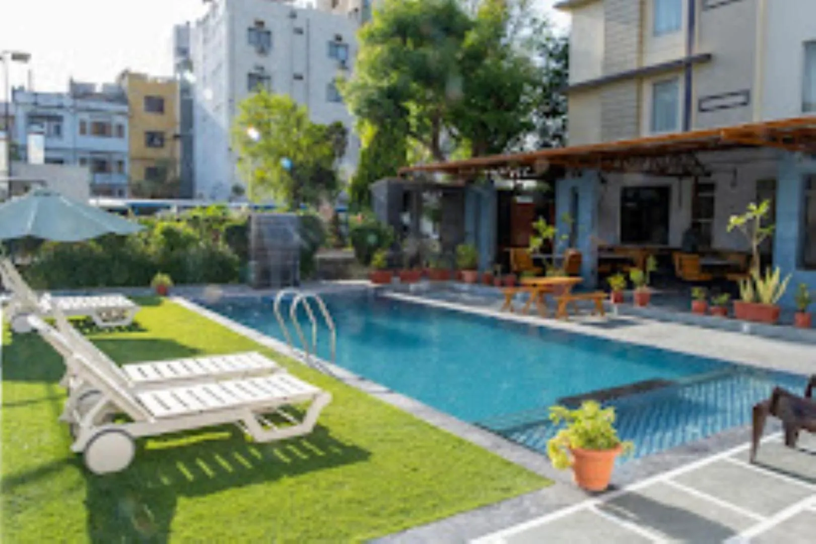 Property building, Swimming Pool in Hotel Mukund Villas