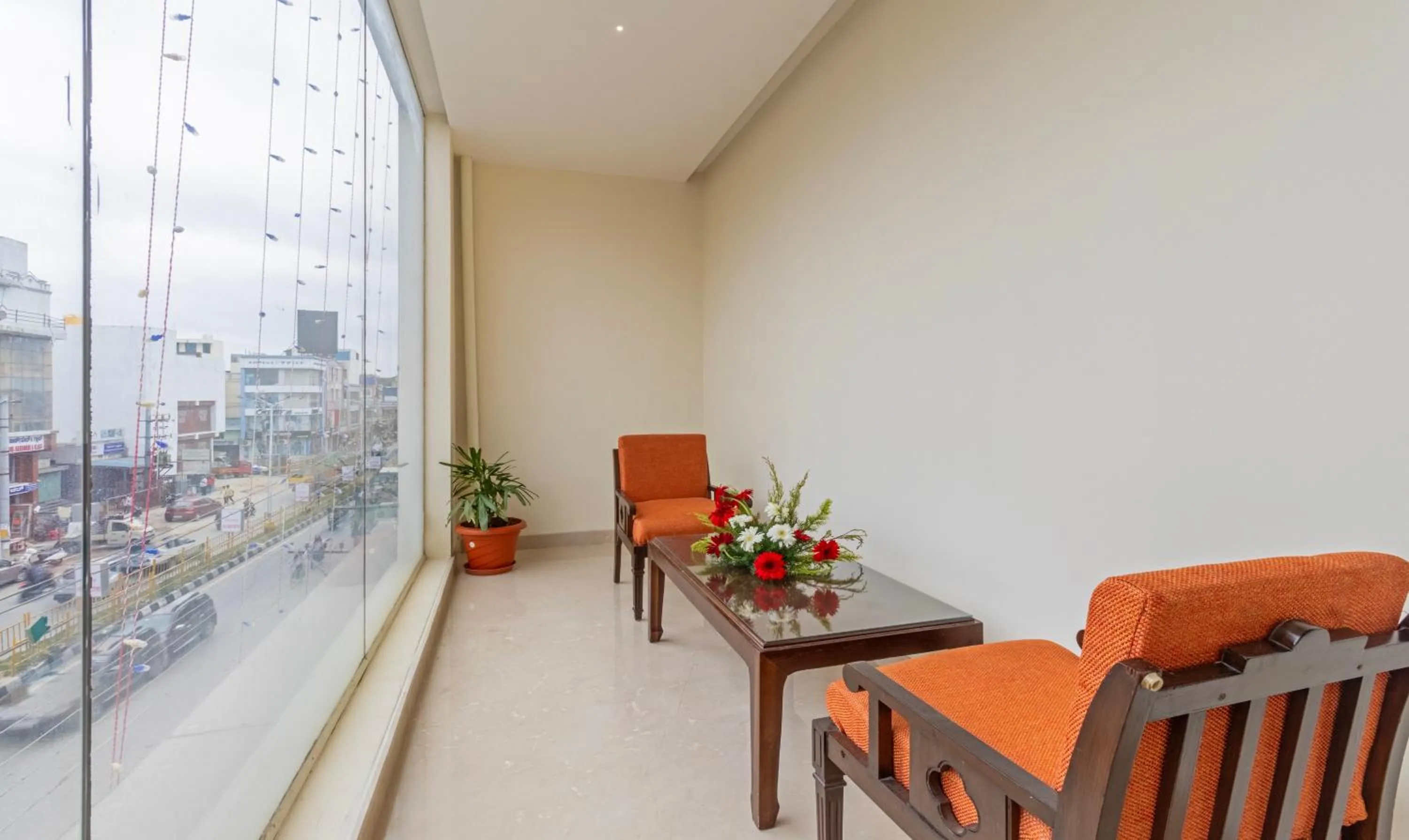 Seating area in Treebo Suvarna Comforts