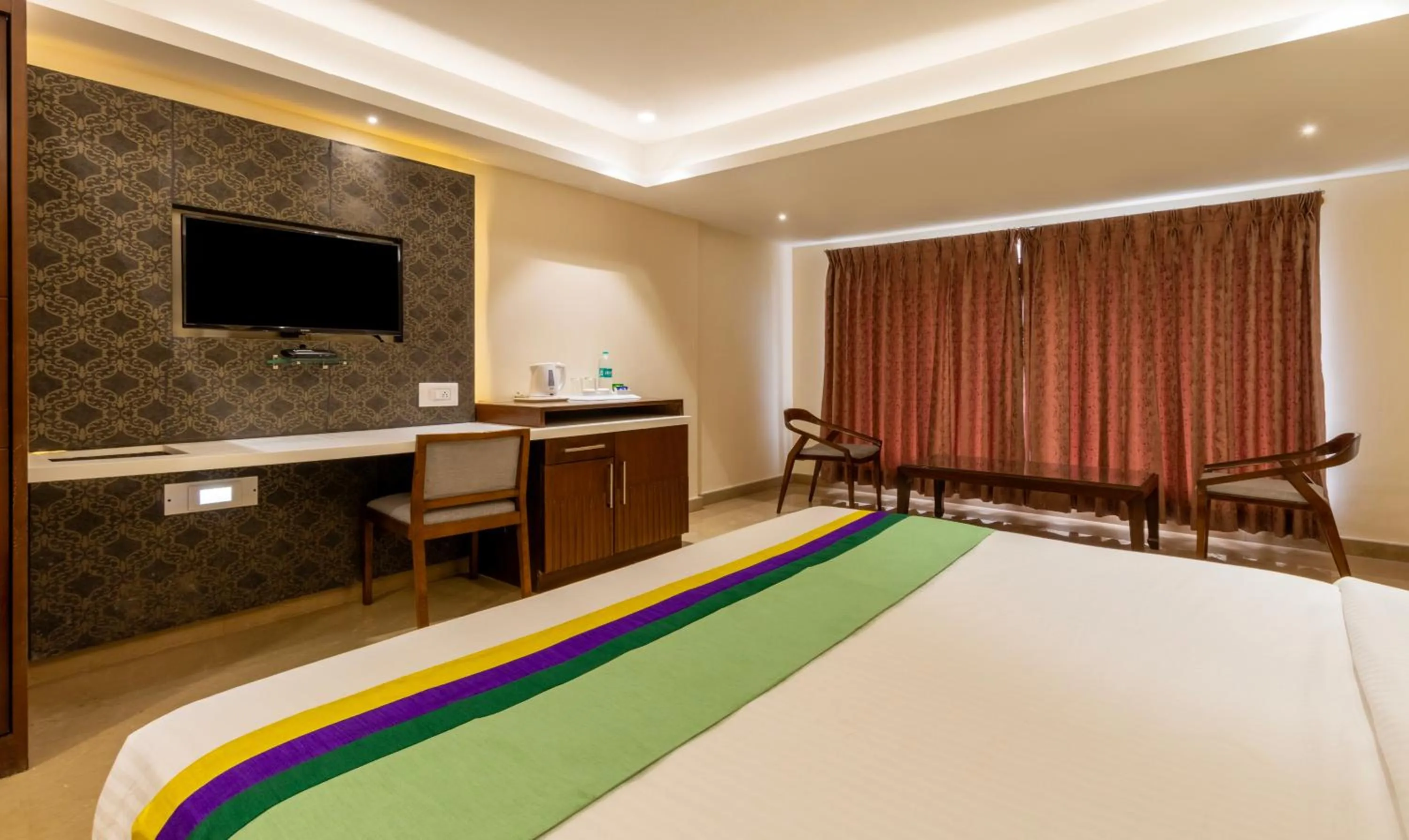 Bedroom, Bed in Treebo Suvarna Comforts