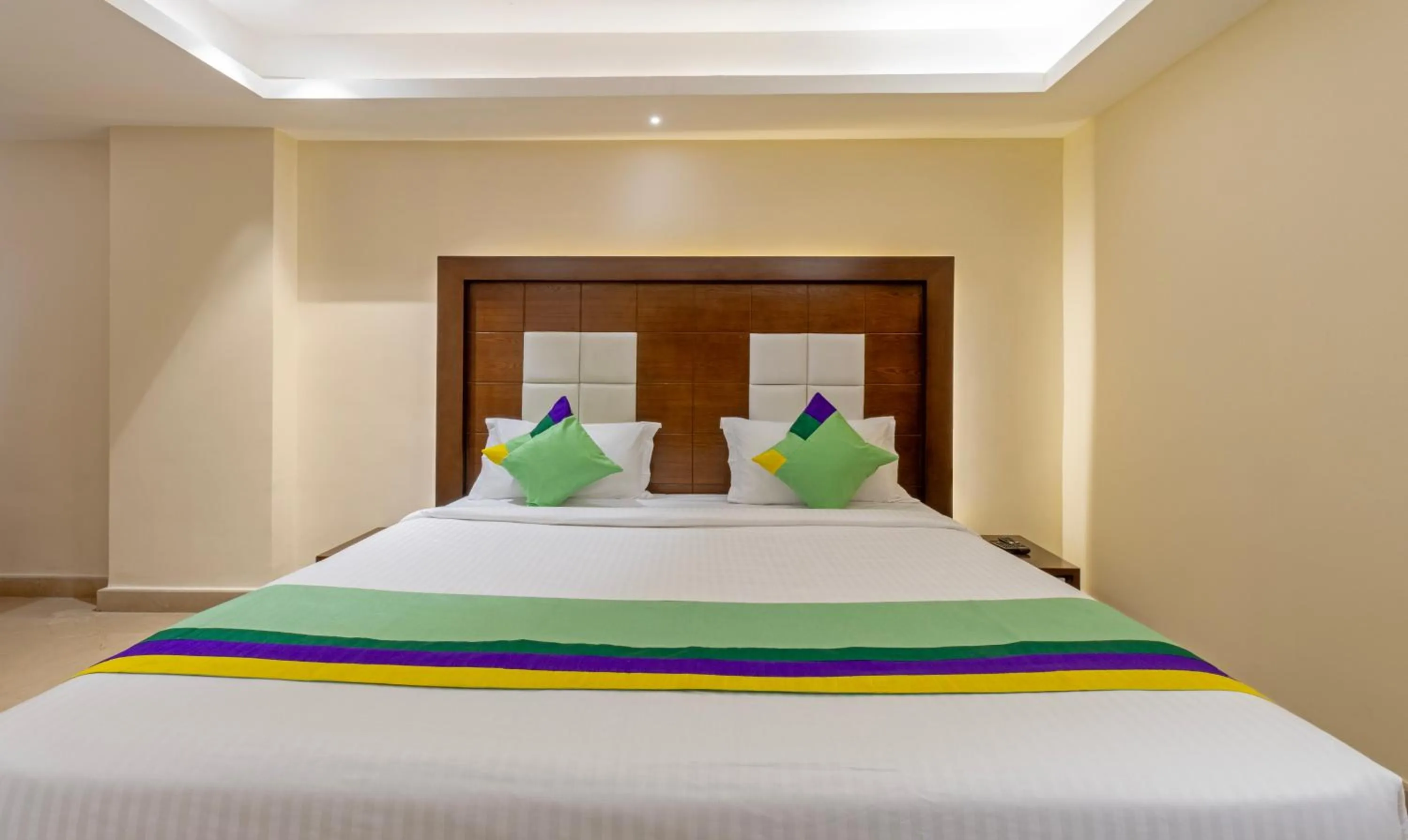 Bedroom, Bed in Treebo Suvarna Comforts