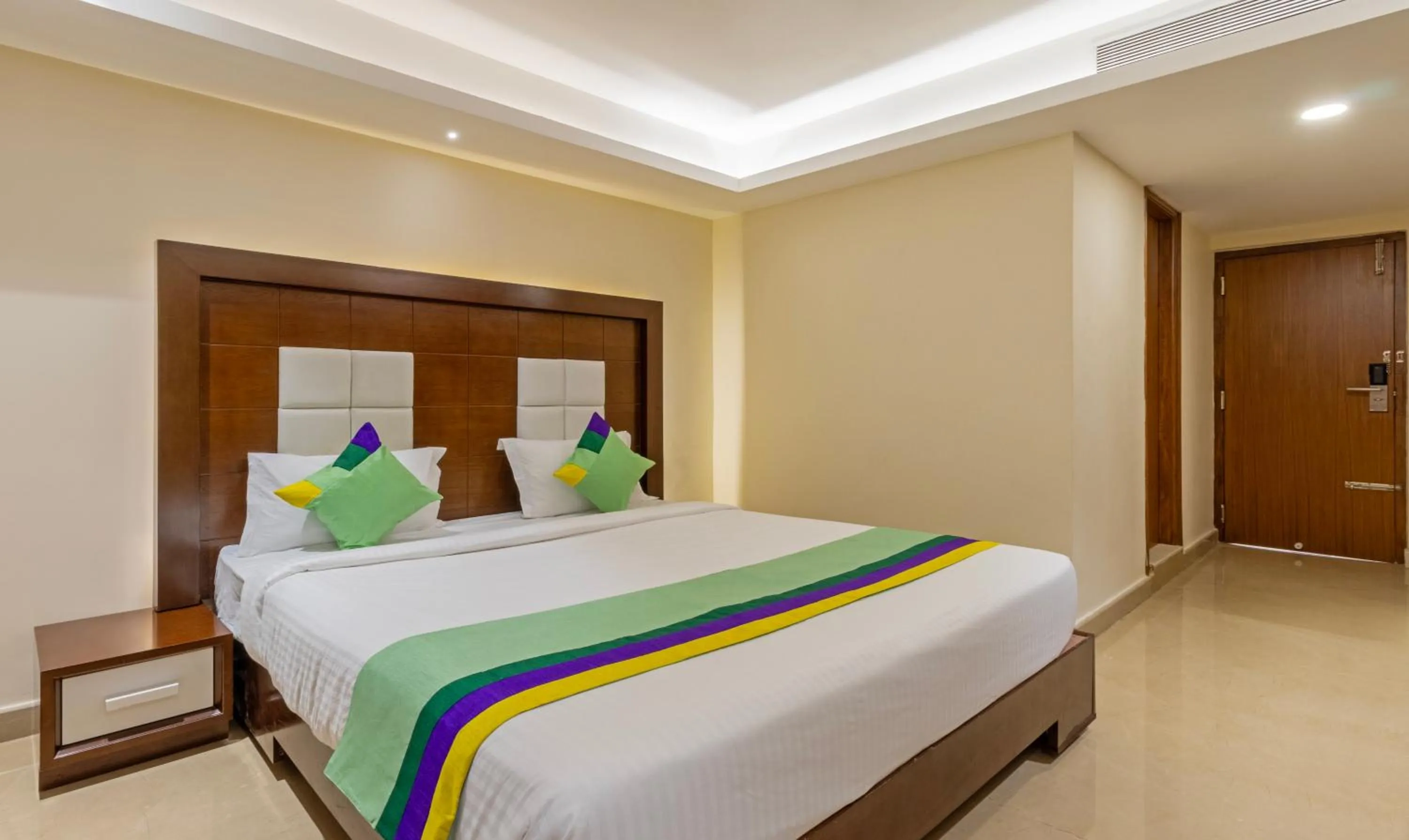 Bedroom, Bed in Treebo Suvarna Comforts