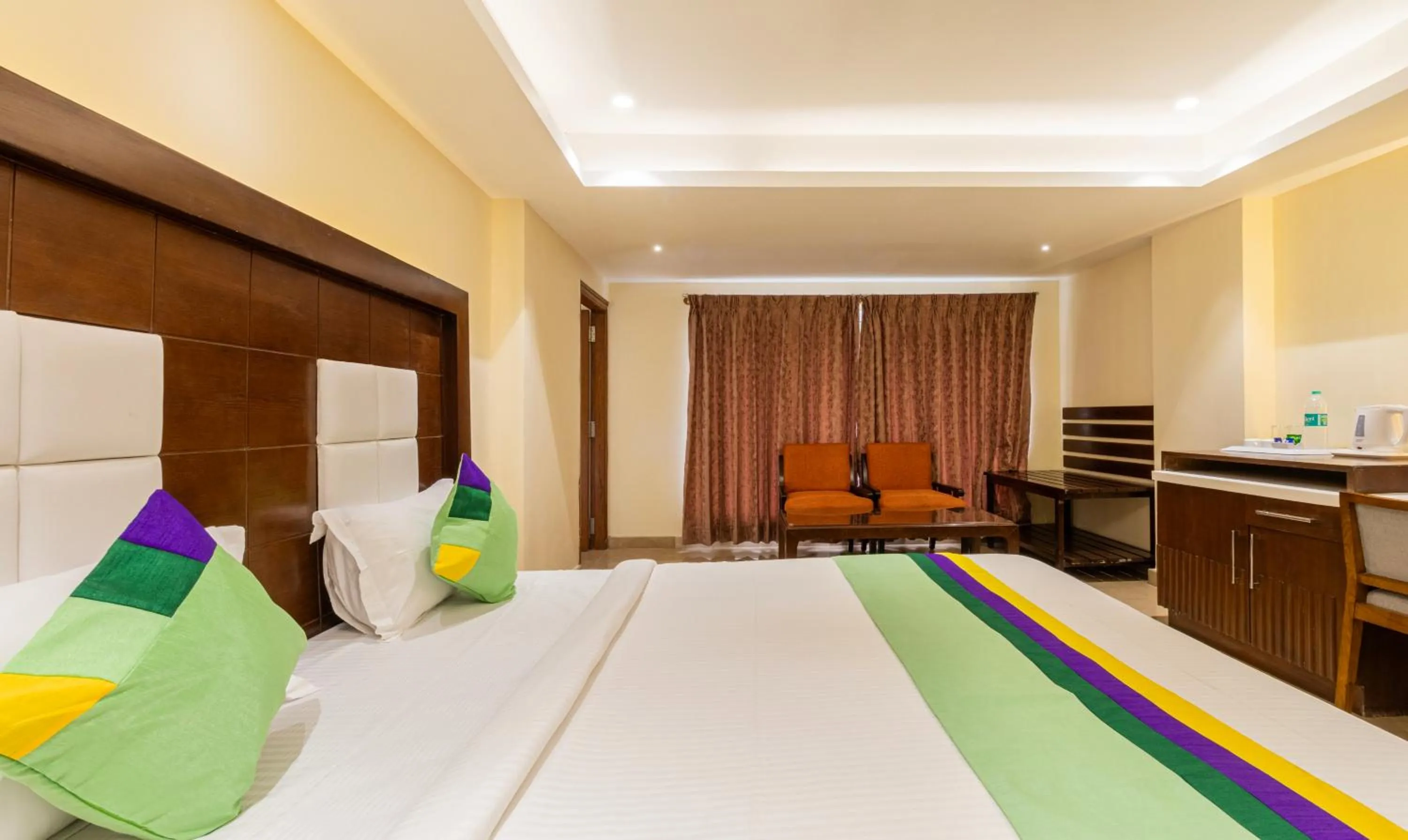 Bedroom, Bed in Treebo Suvarna Comforts