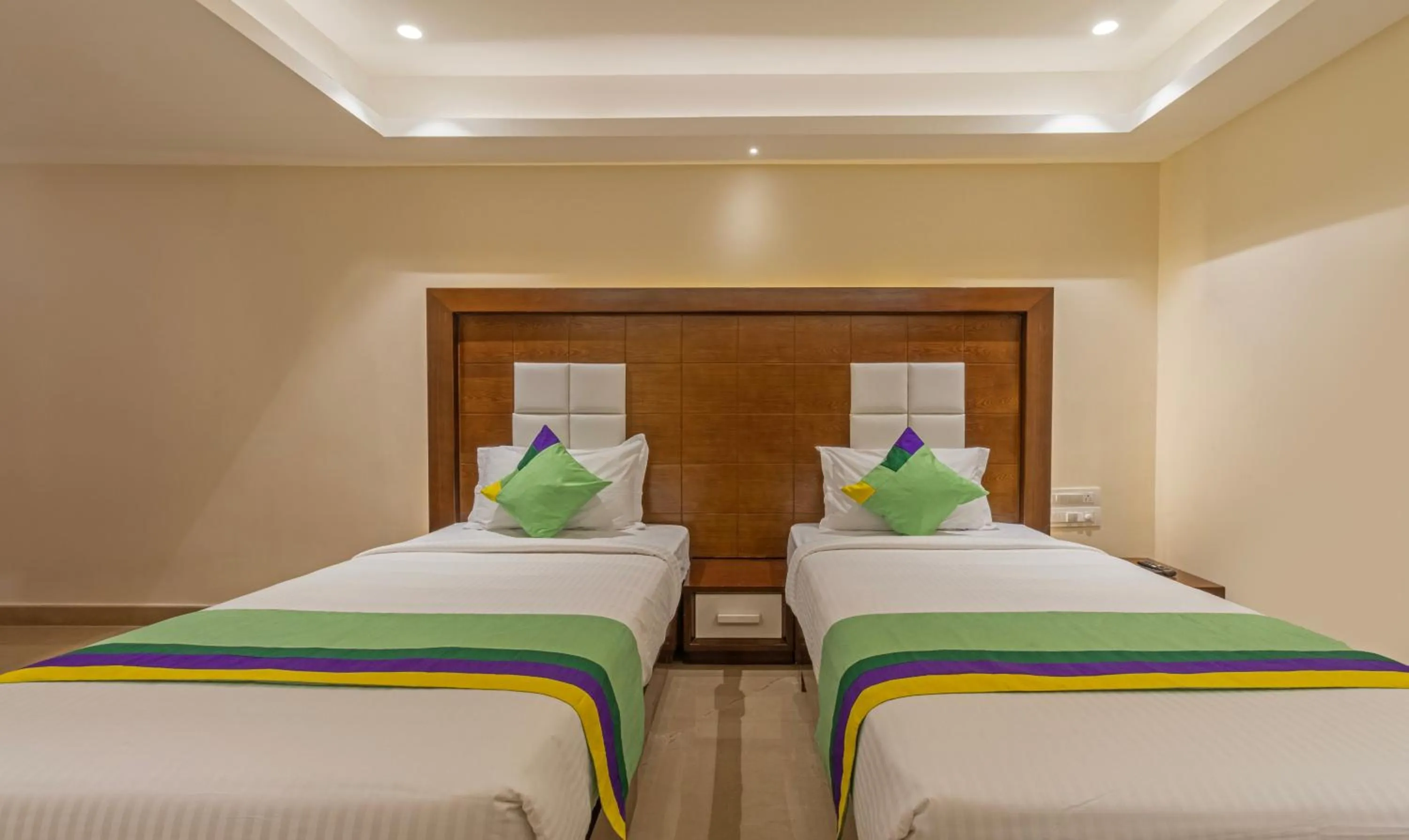 Bedroom, Bed in Treebo Suvarna Comforts