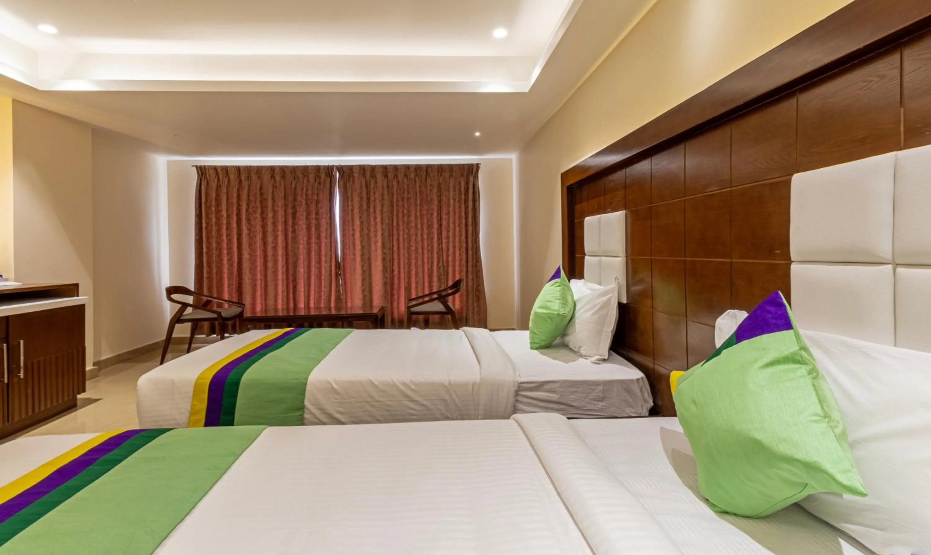 Bedroom, Bed in Treebo Suvarna Comforts