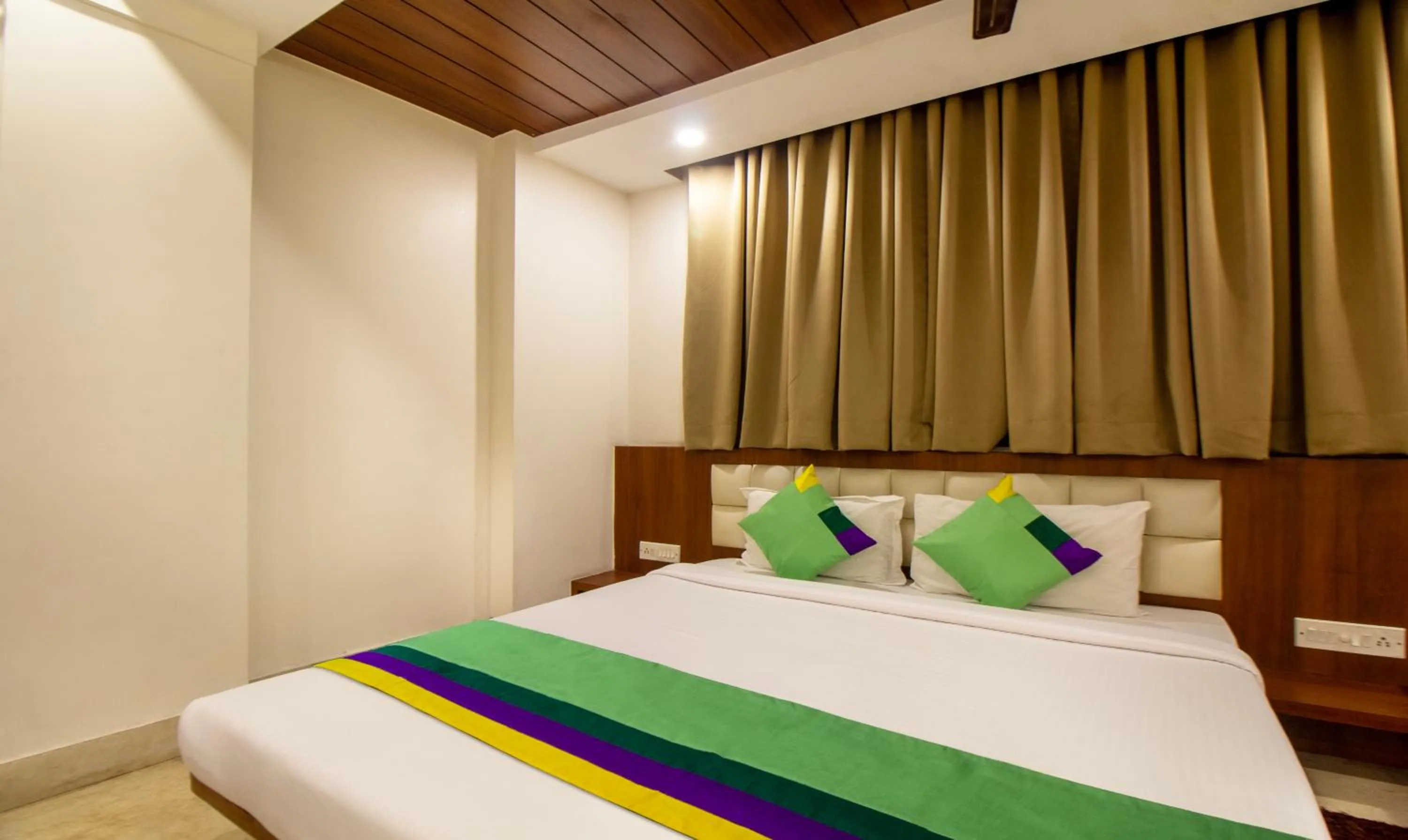 Bed in Treebo Royal Orbit, Metropoliton