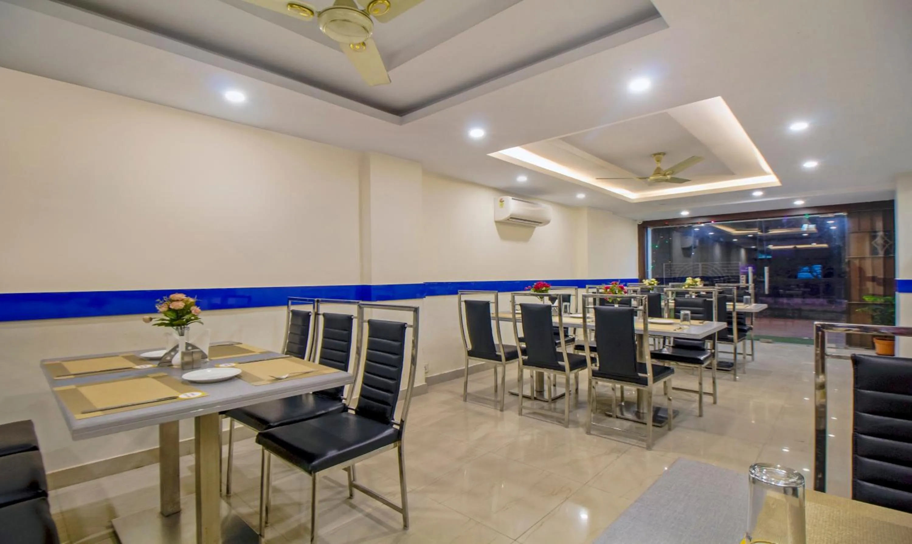 Dining area in Treebo Royal Orbit, Metropoliton