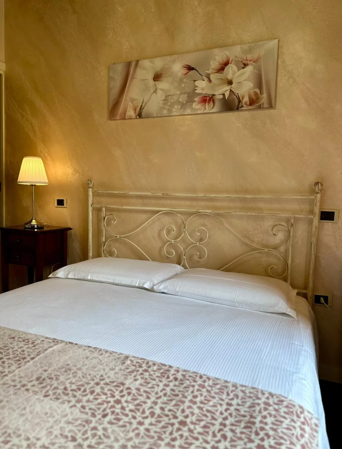 Bed in Relais Ponte Pietra