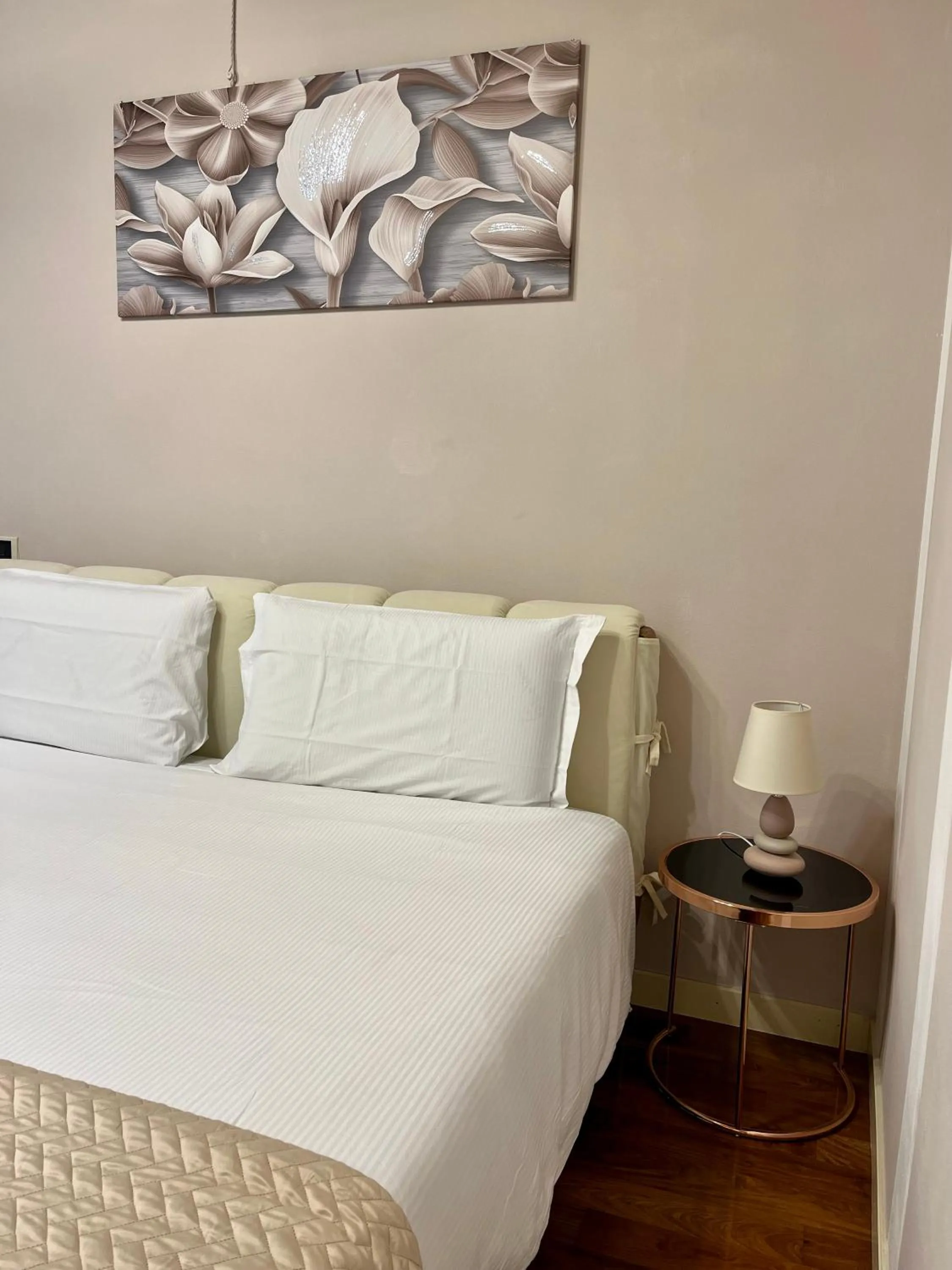 Bed in Relais Ponte Pietra