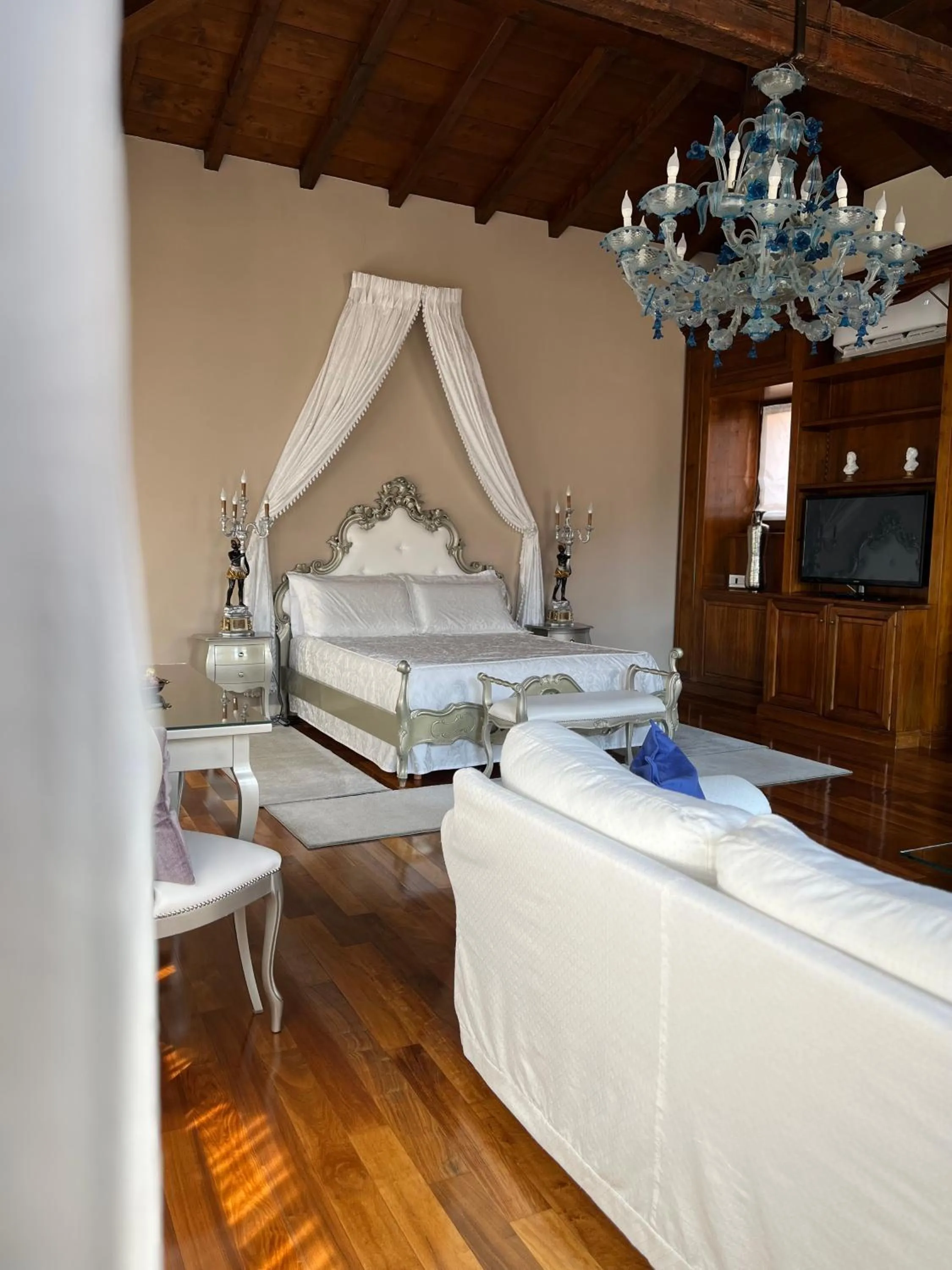 Bed in Relais Ponte Pietra