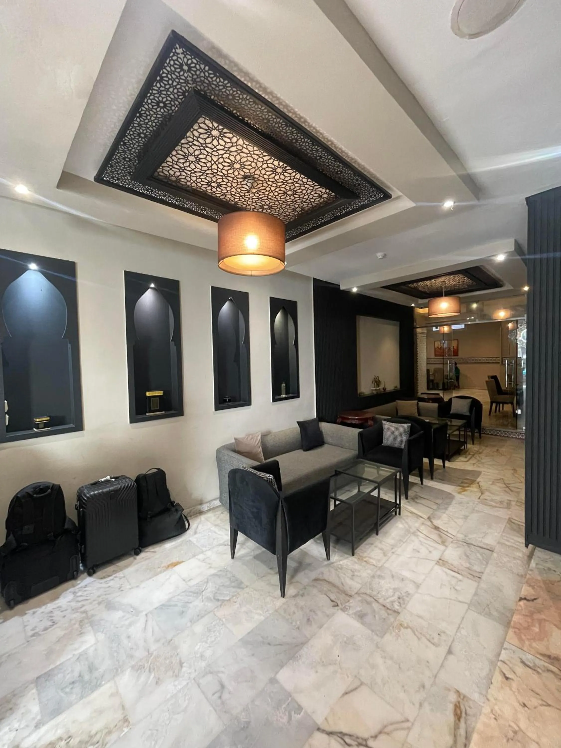 Lobby or reception in Cadé Hotel