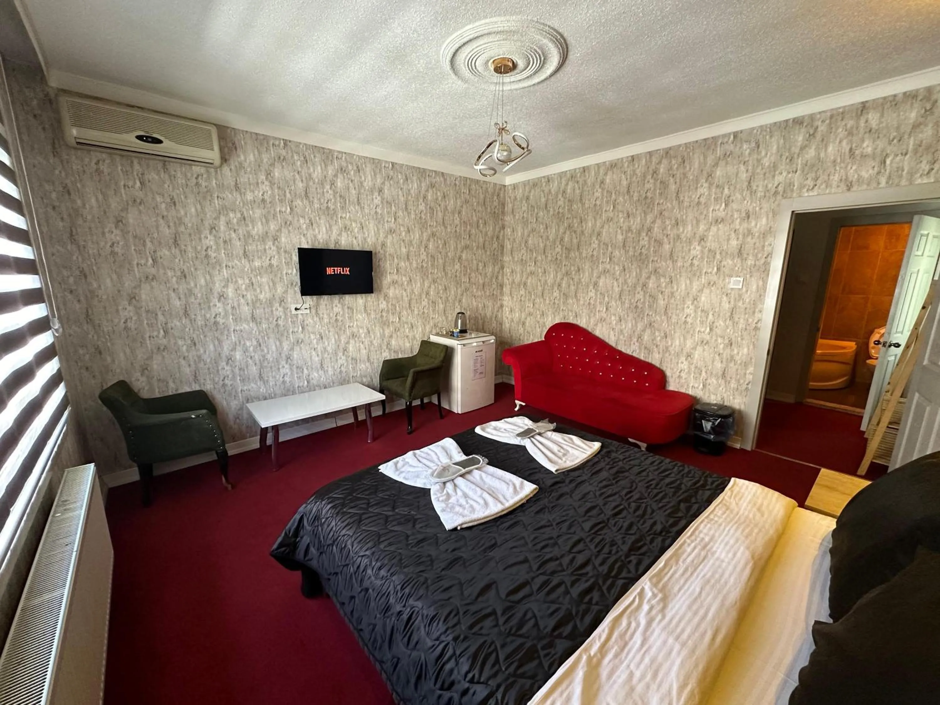 Communal lounge/ TV room, Bed in ENJOY HOUSE BOUTİQE OTEL