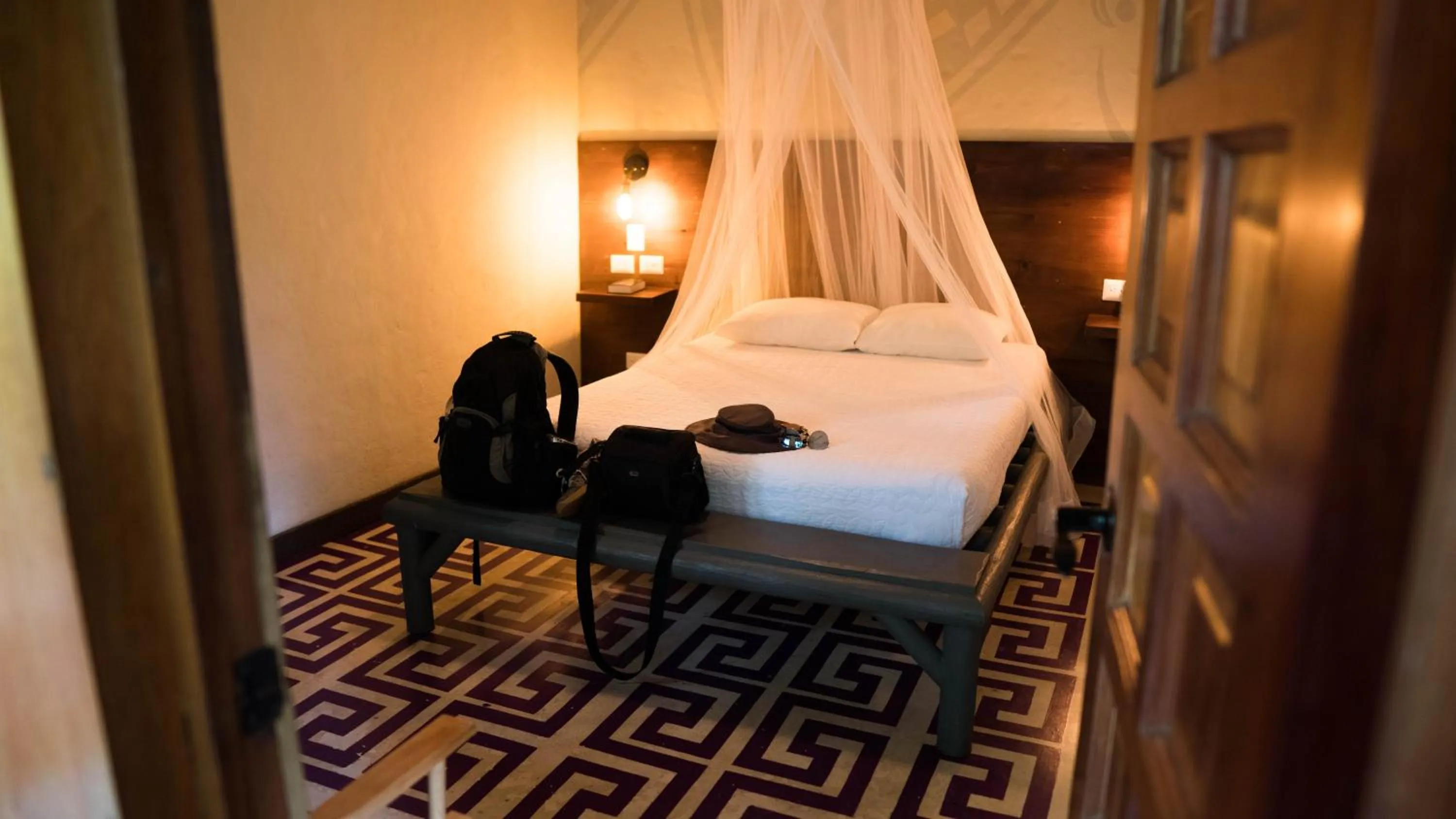 Bed in Jungle Lodge Tikal Hostal