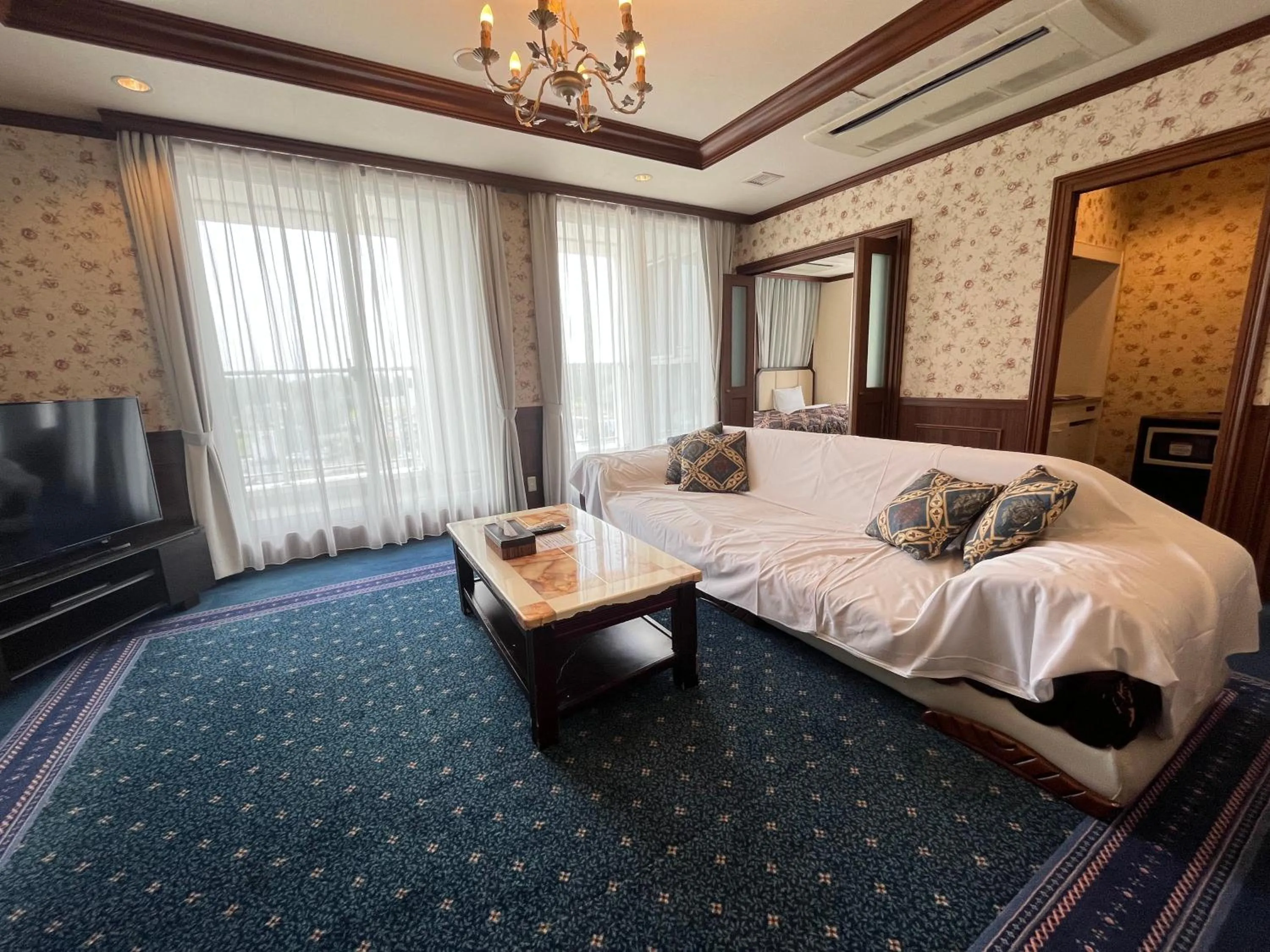 Living room, Bed in Spa Resort LiVEMAX