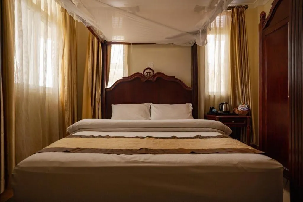 Bed in Island Paradise Inn