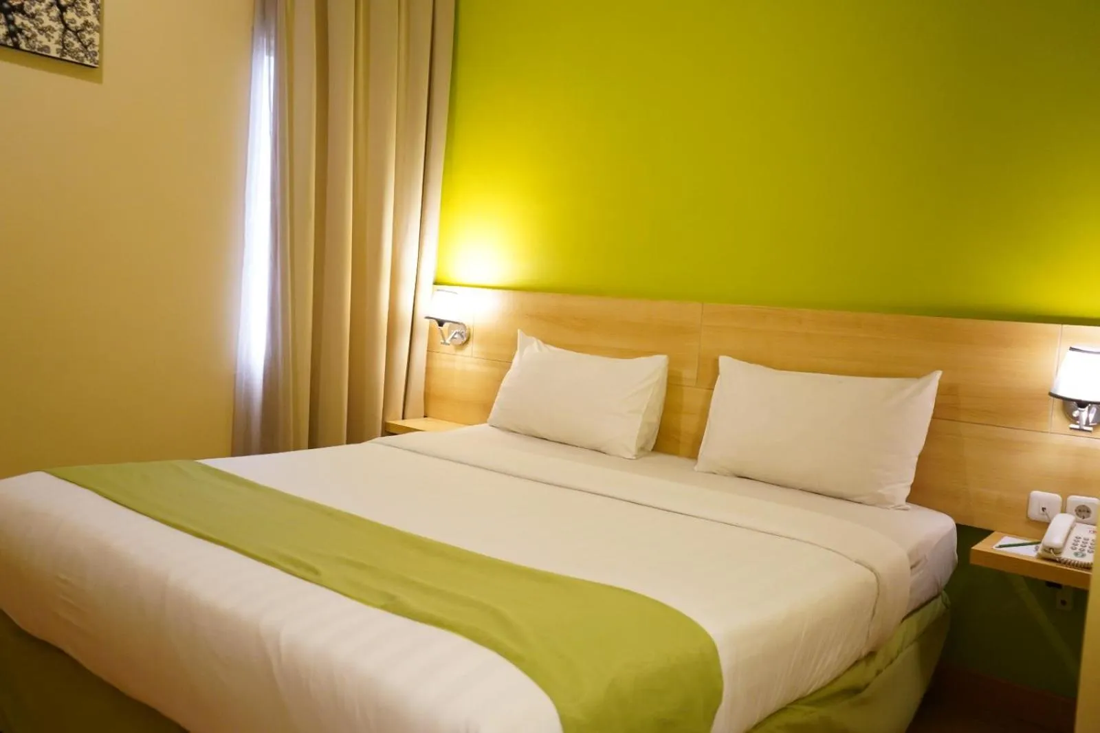 Bed in Lorin Syariah Hotel Sentul
