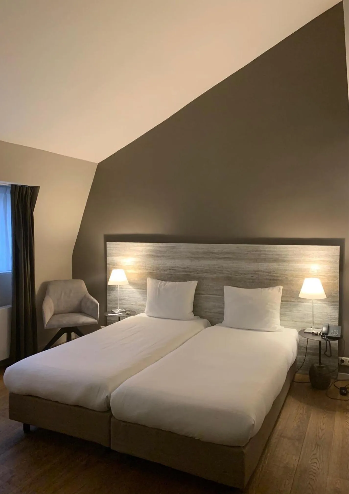 Bed in Hotel Au Quartier