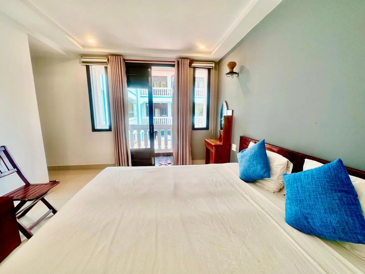 Photo of the whole room, Bed in Seagull Nest Hoi An Beach Village