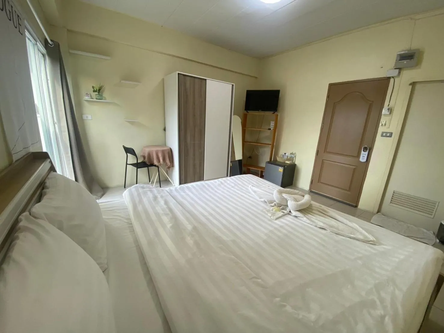 Photo of the whole room, Bed in Grand Bangsaen Hotel