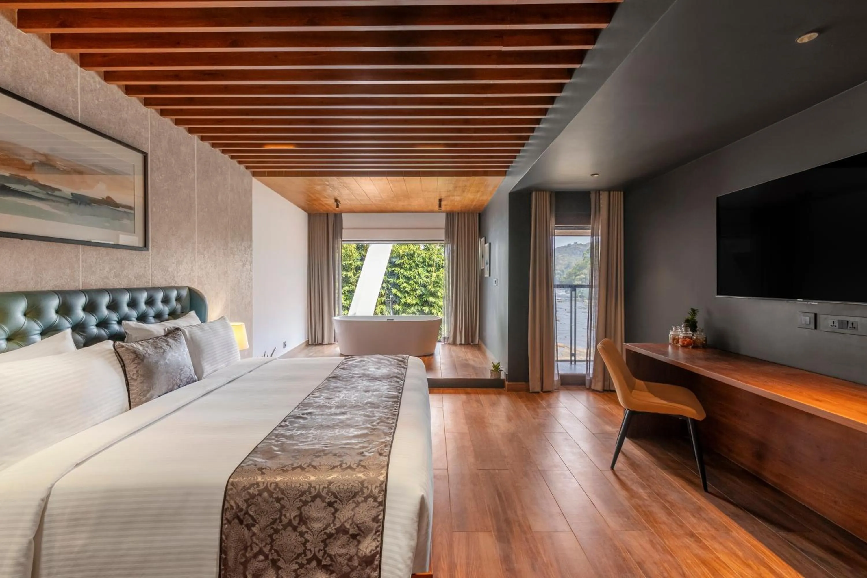 Communal lounge/ TV room, Bed in Sterling Athirappilly