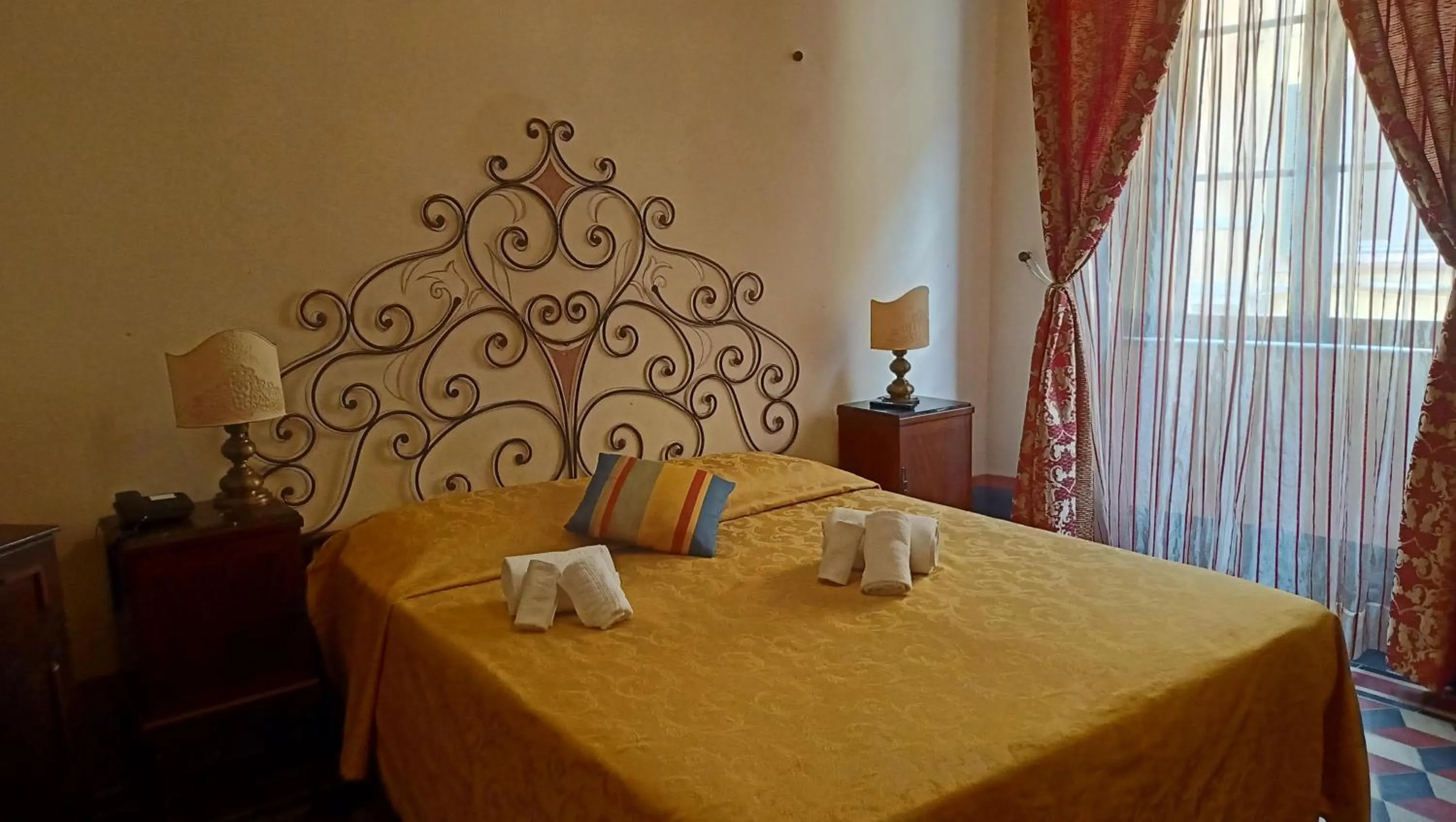 Bedroom in Relais Corso Storico