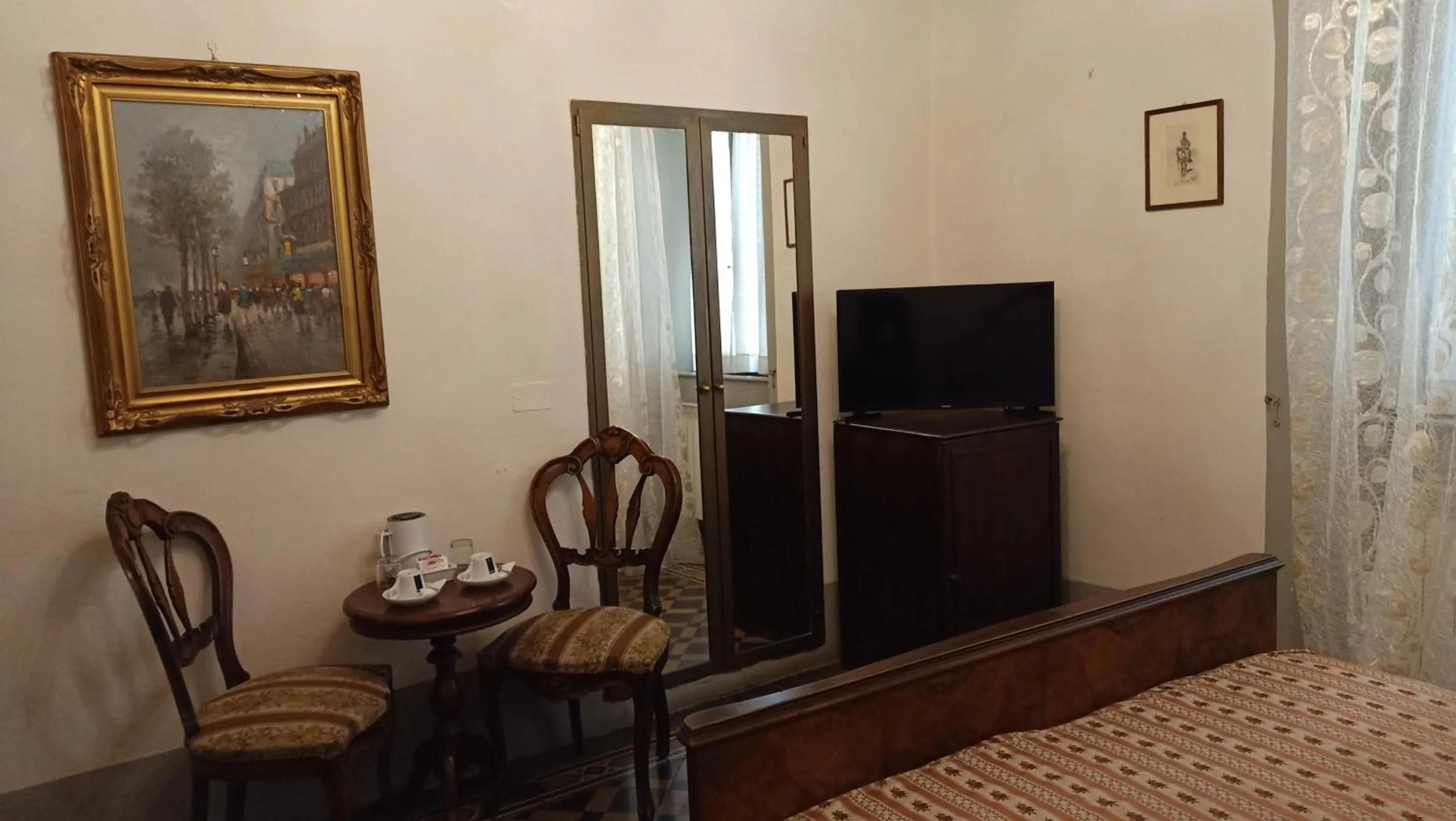Photo of the whole room, TV/Entertainment Center in Relais Corso Storico