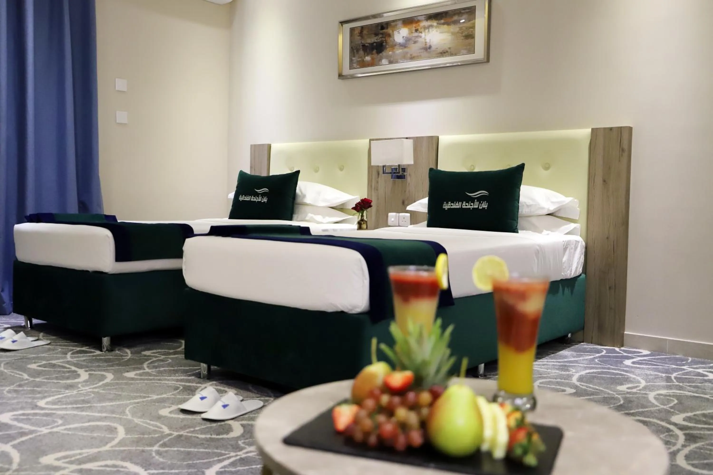 Bed in Sunrise Suites