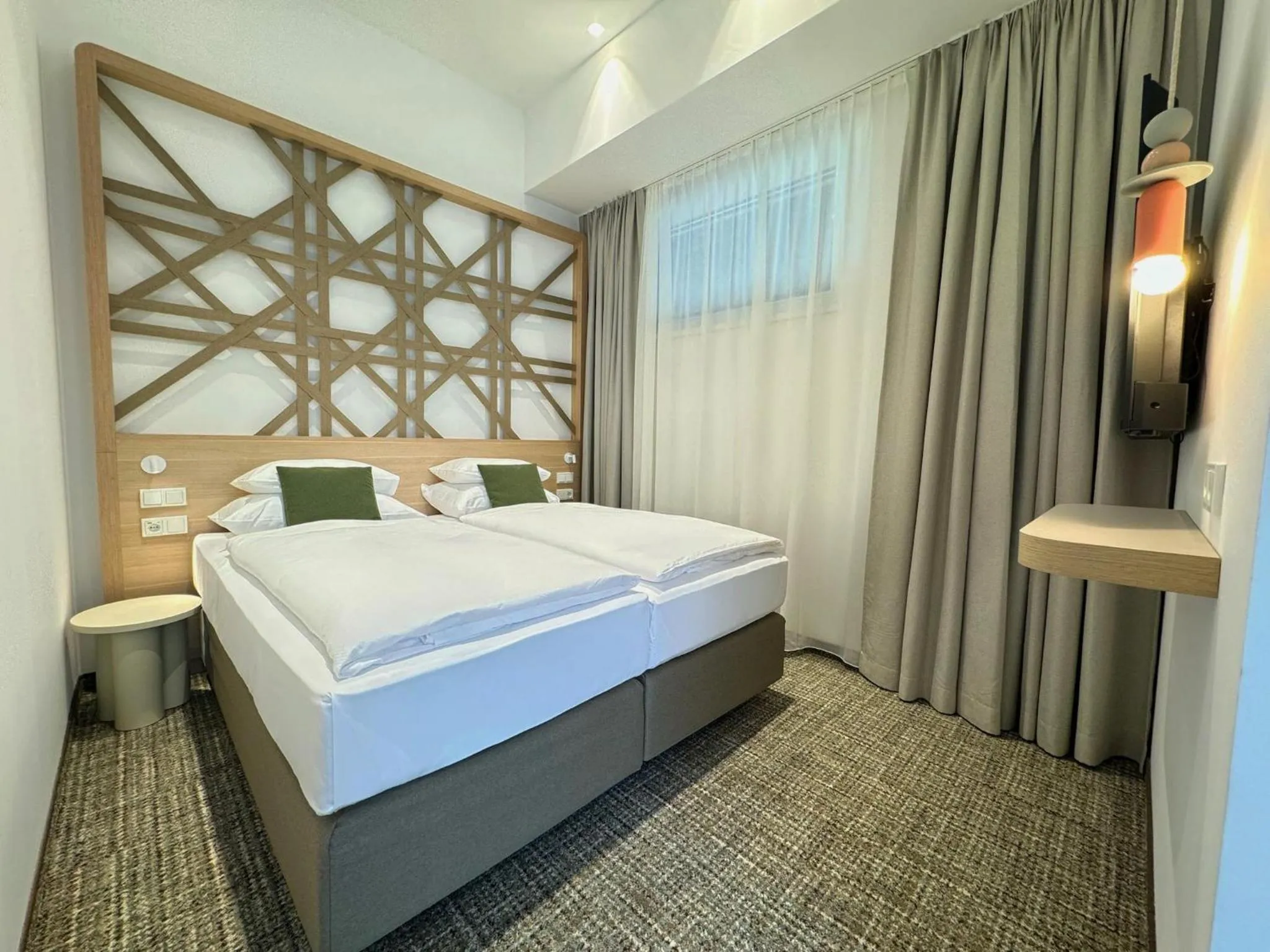 Bed in ARCOTEL AQ Wien