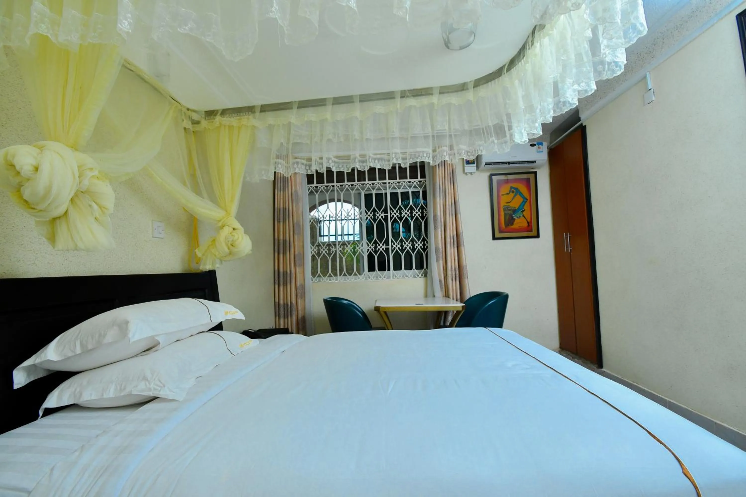 Bed in Fancy Hotel Munyonyo