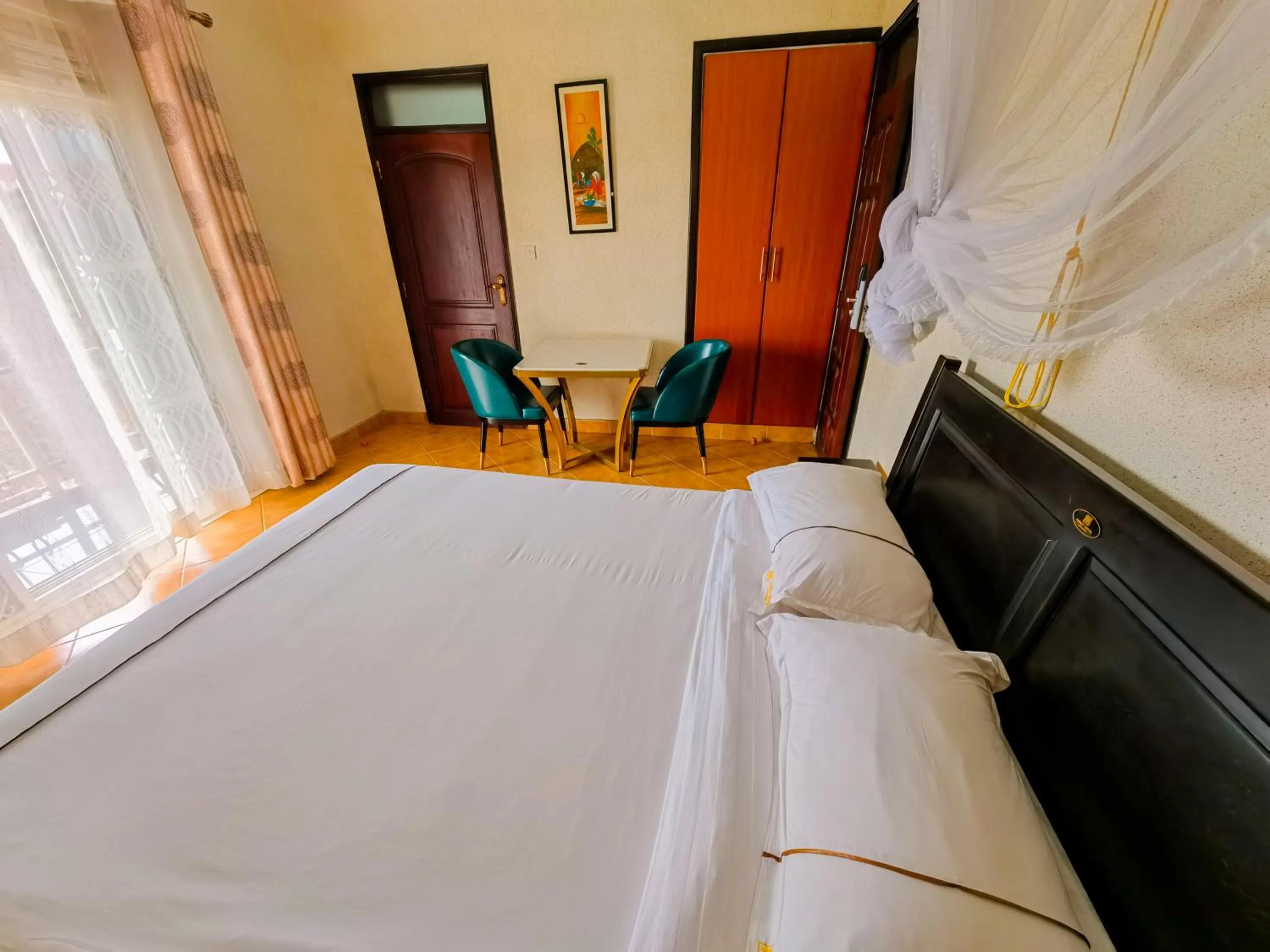 Bed in Fancy Hotel Munyonyo